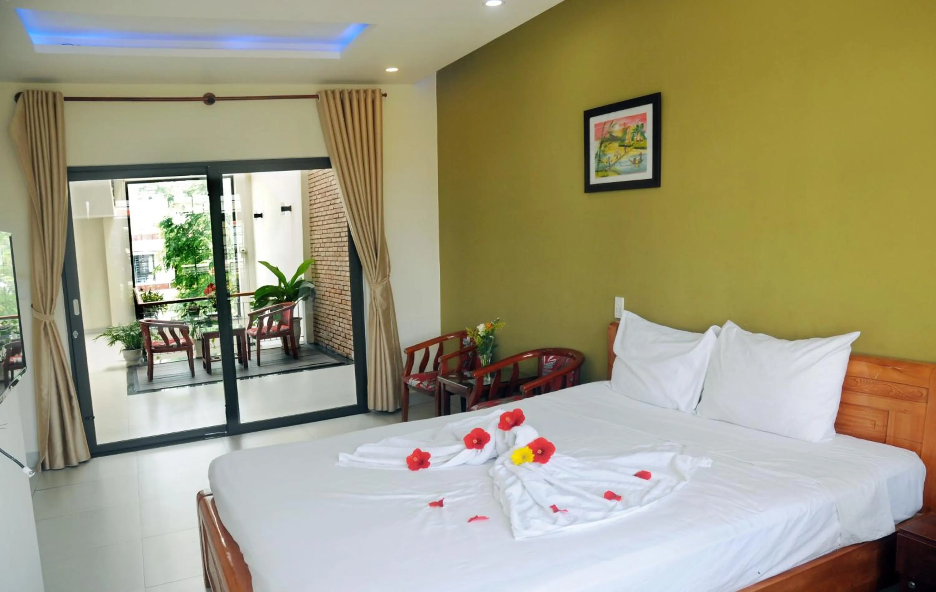 Bed in Melody Boutique Villa Hoi An