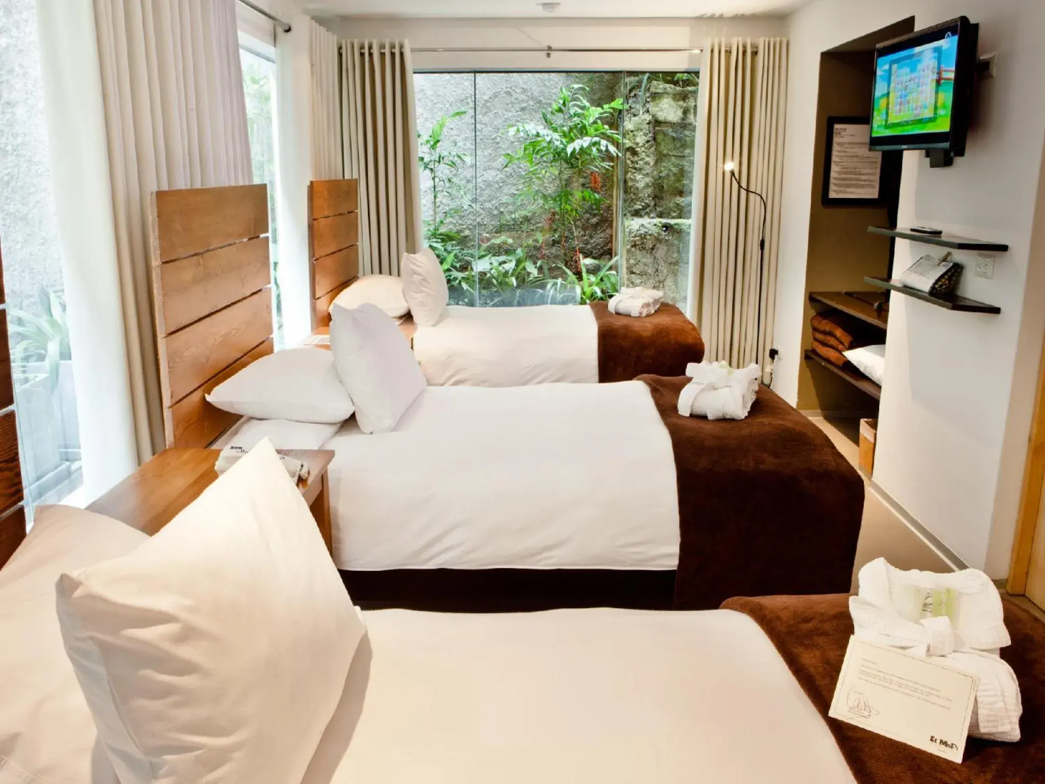 Photo of the whole room, Bed in El MaPi by Inkaterra Photo of the whole room, Bed in El MaPi by Inkaterra