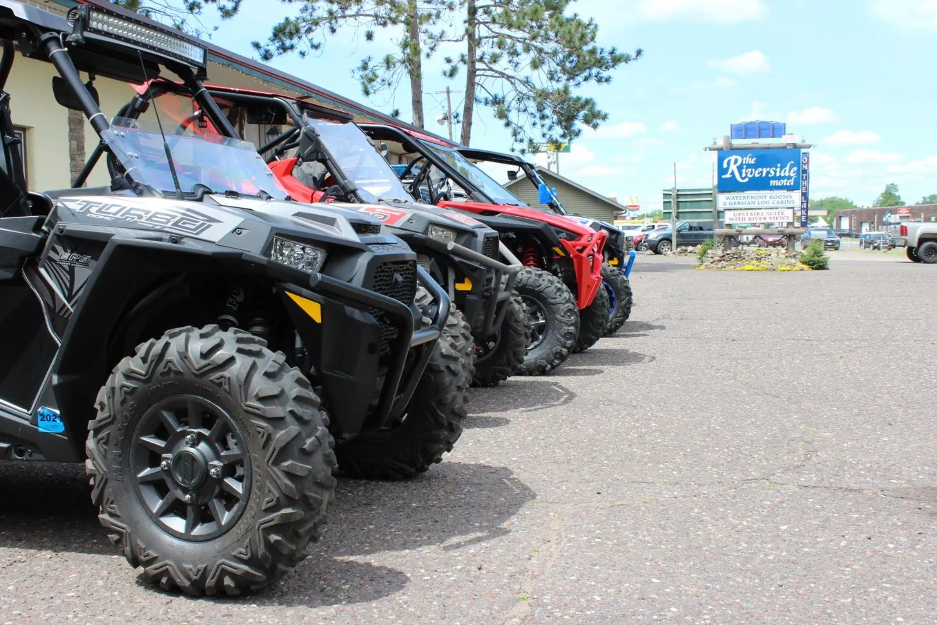 Property logo or sign in Riverside Motel