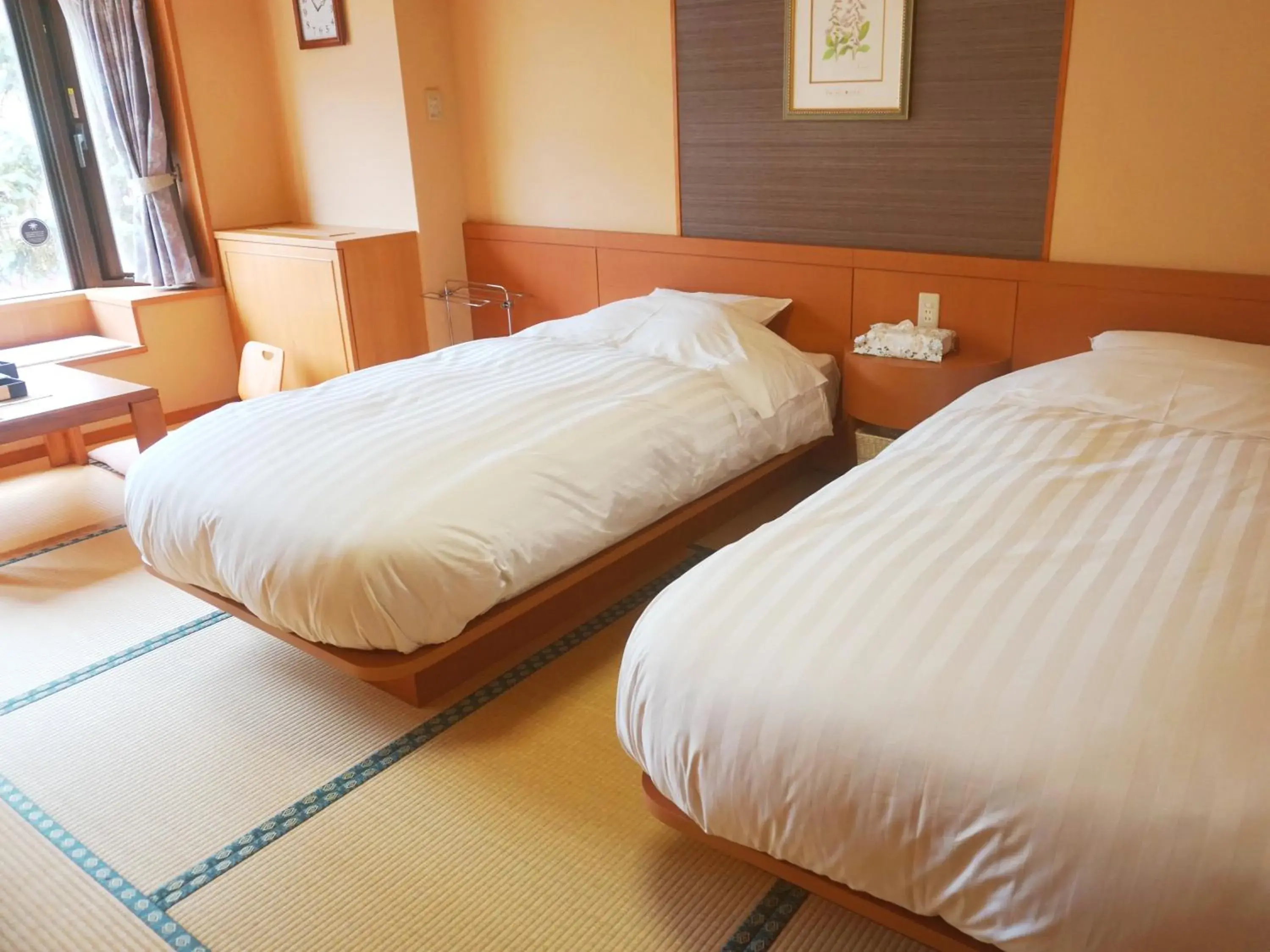 Bed in THE FOREST AKAN Tsuruga Resort Bed in THE FOREST AKAN Tsuruga Resort