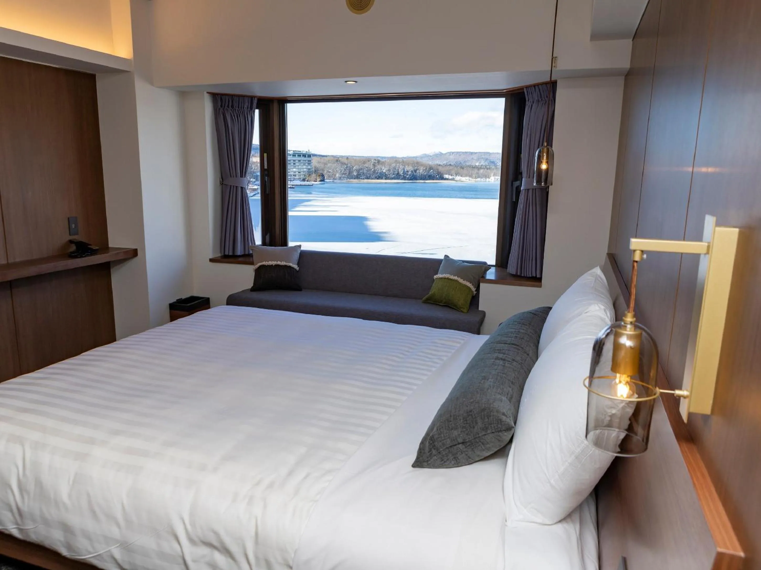 View (from property/room), Bed in THE FOREST AKAN Tsuruga Resort