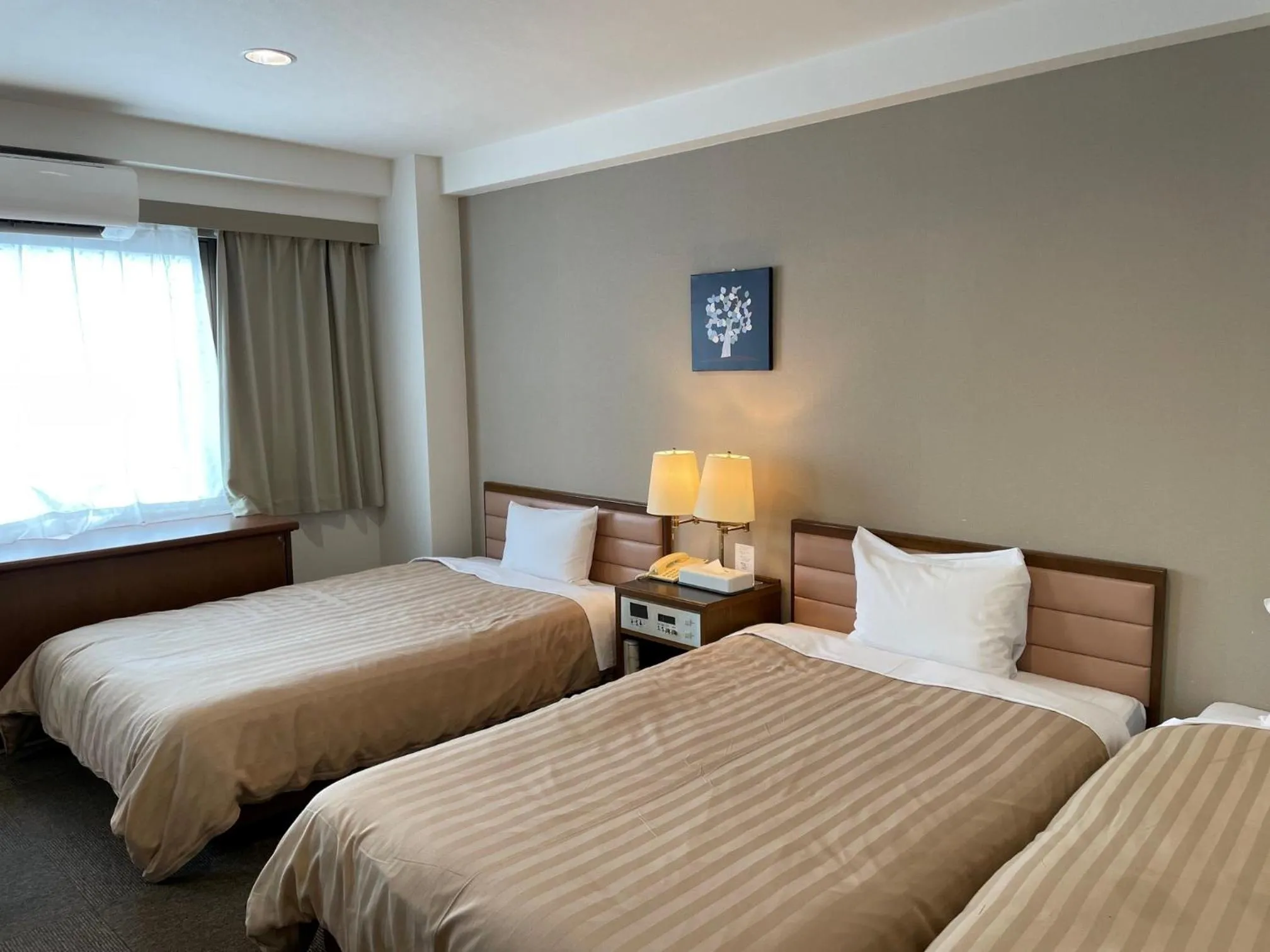 Bed in Kanku Sun Plus Yutaka