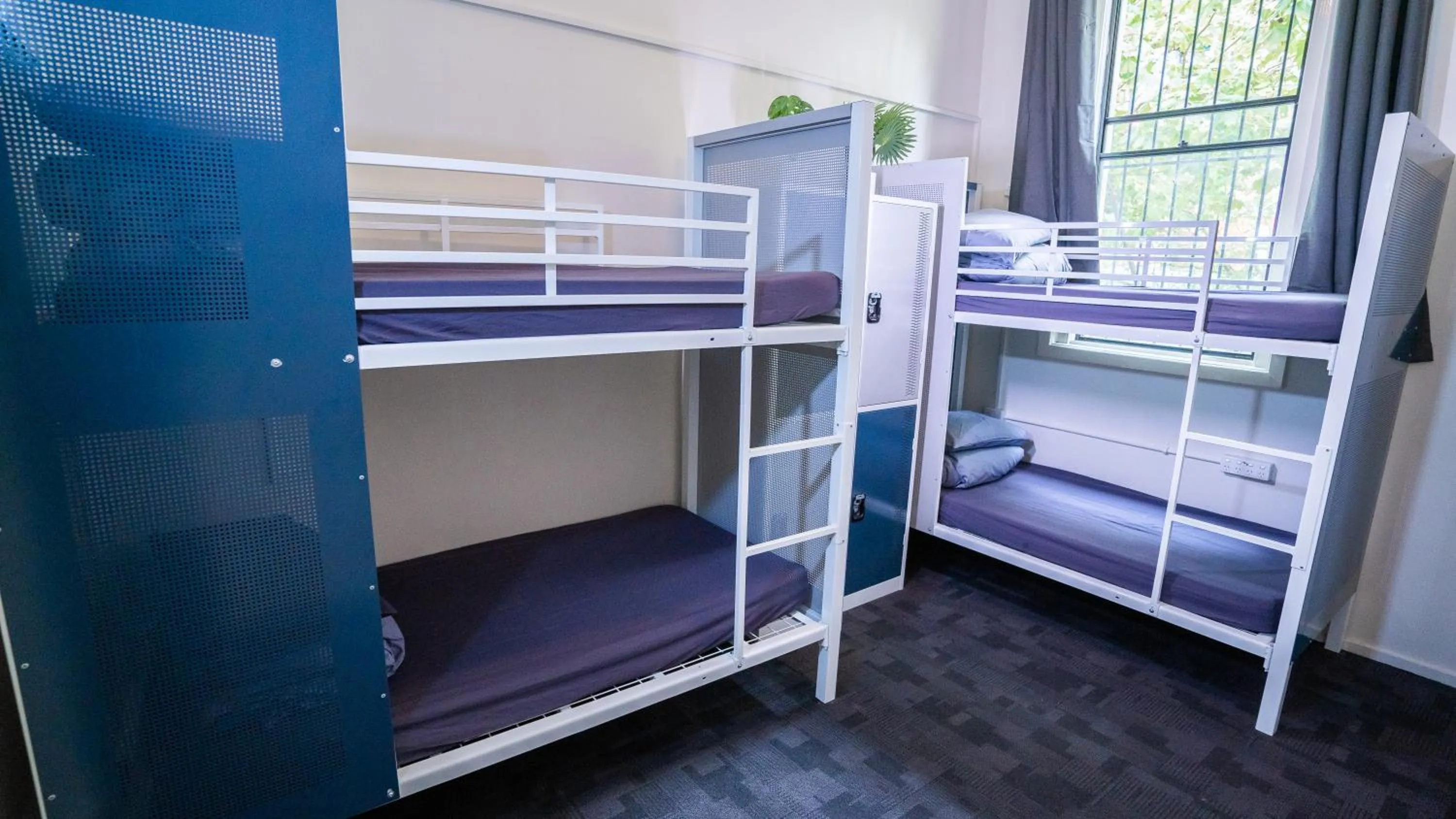 Photo of the whole room, Bed in Mad Monkey Downtown