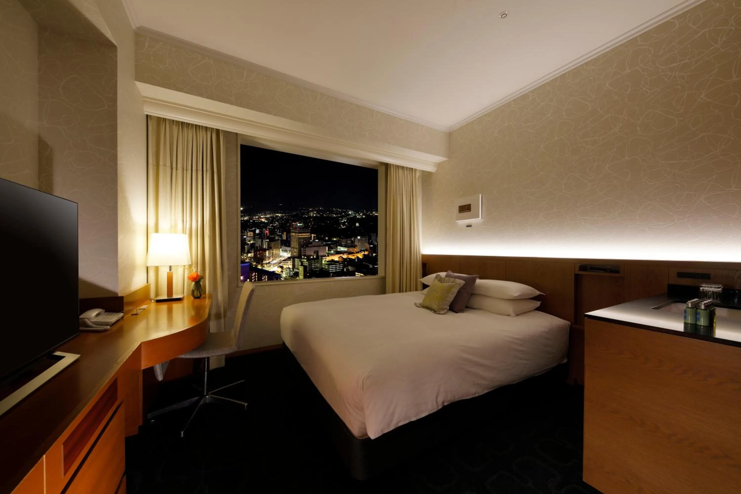 Bed in Hotel Nikko Kanazawa