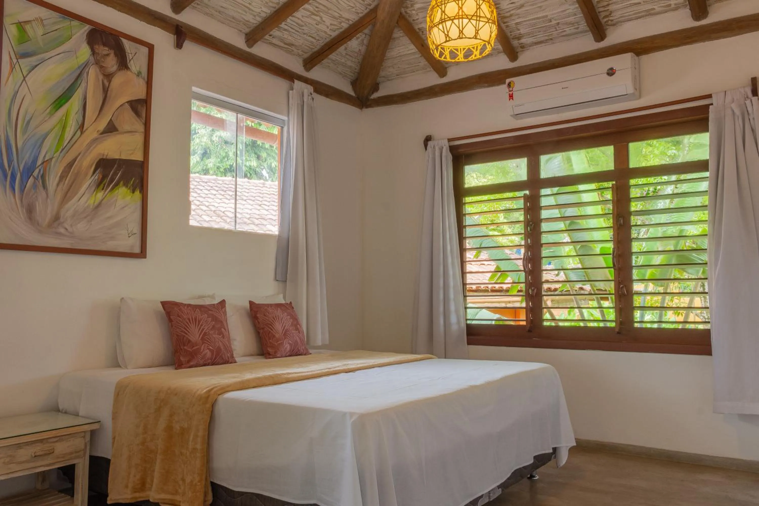 Bed in Pariri Suites