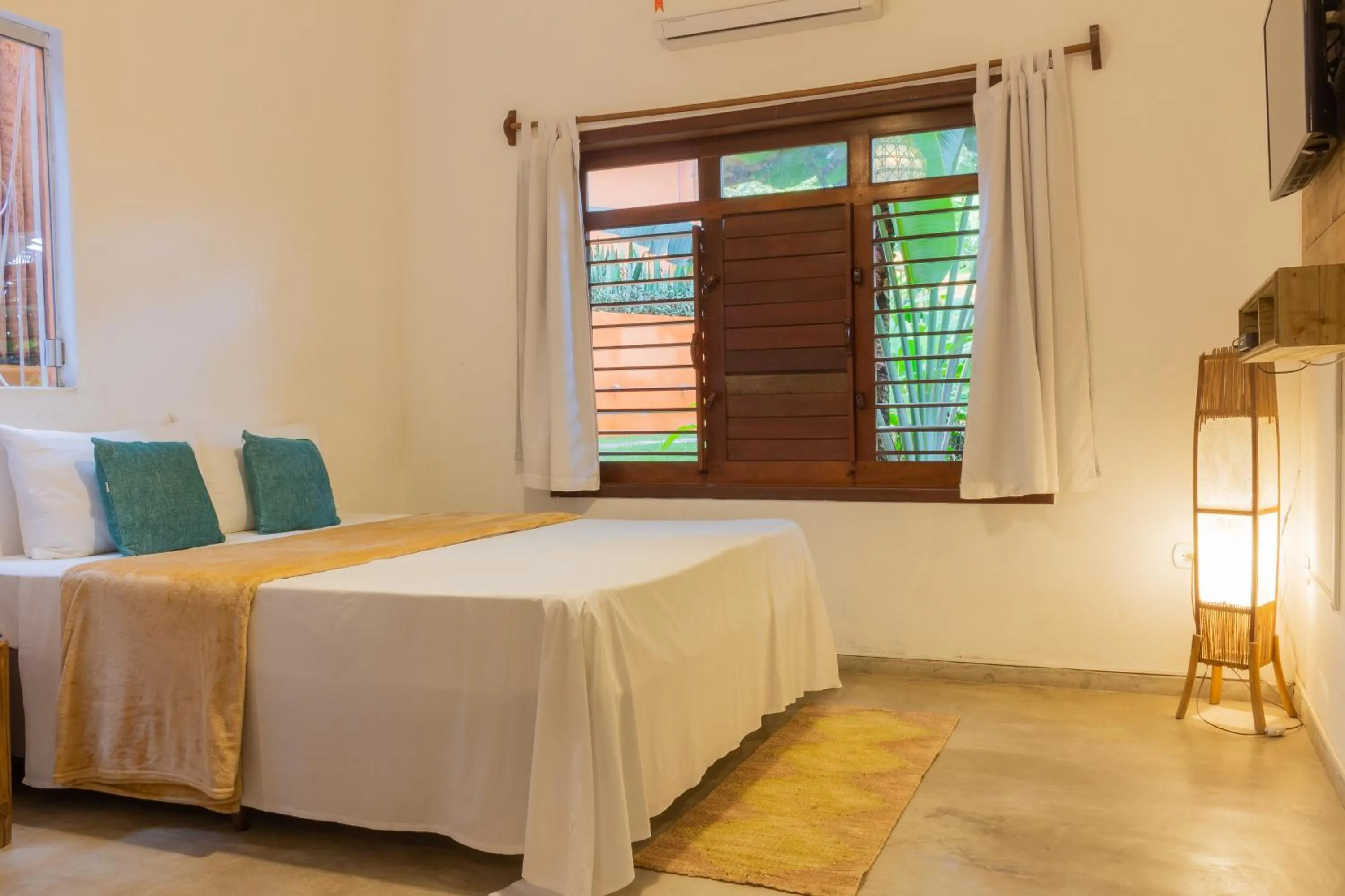 Bed in Pariri Suites