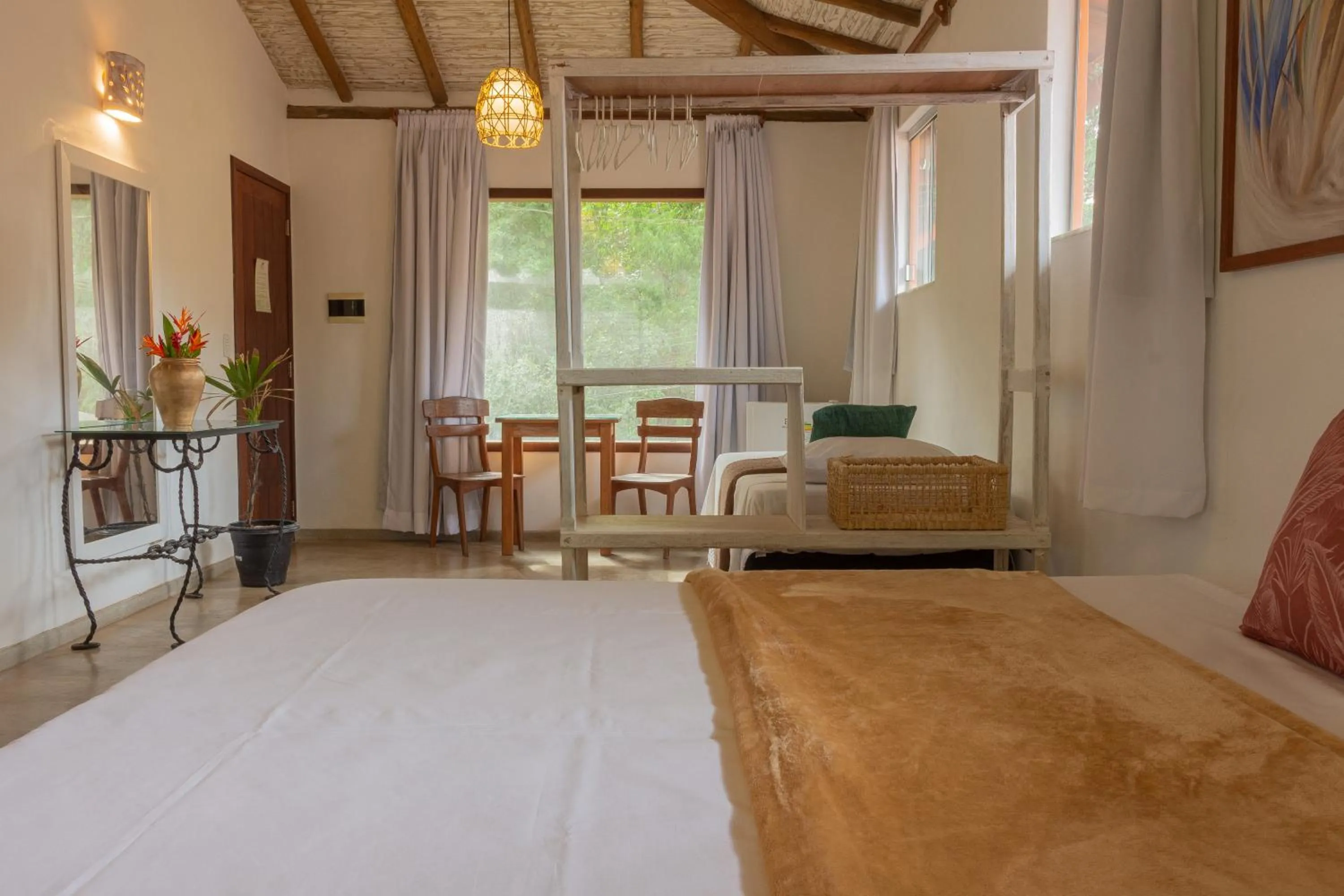 Bed in Pariri Suites