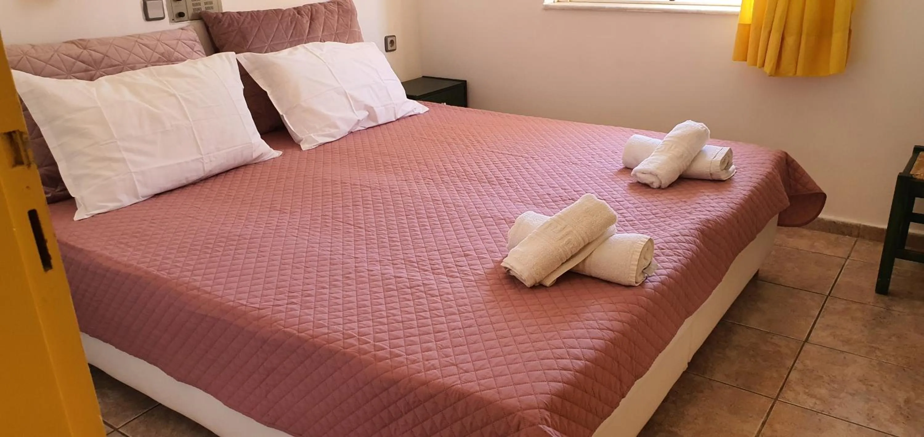 Bed in Stella Apartments