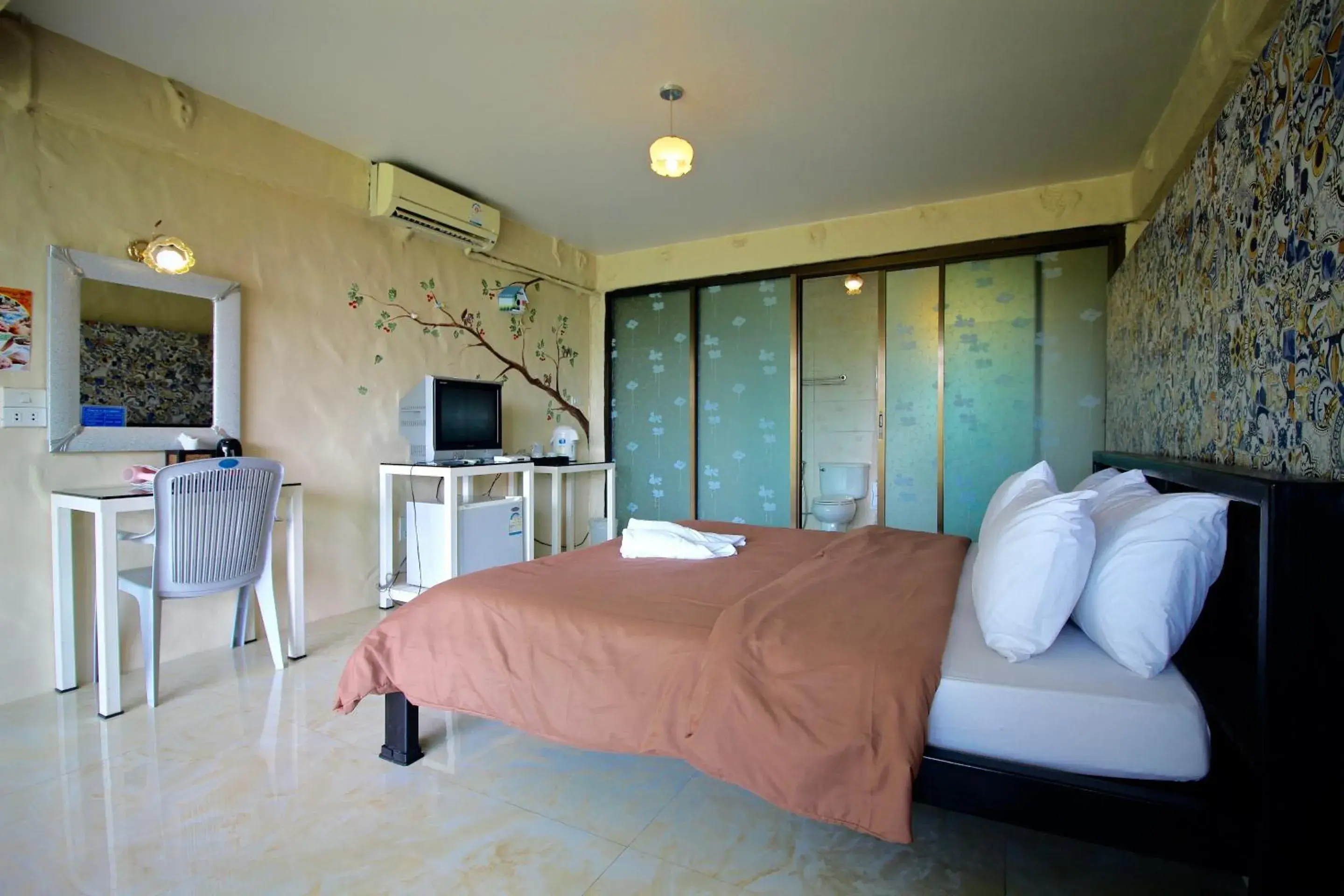 Photo of the whole room, Bed in Yoko River Kwai Resort Photo of the whole room, Bed in Yoko River Kwai Resort