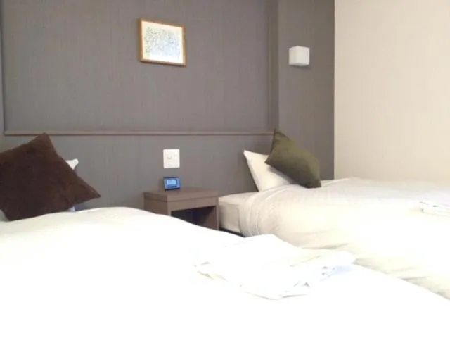 Photo of the whole room, Bed in Green Sky Hotel Takehara