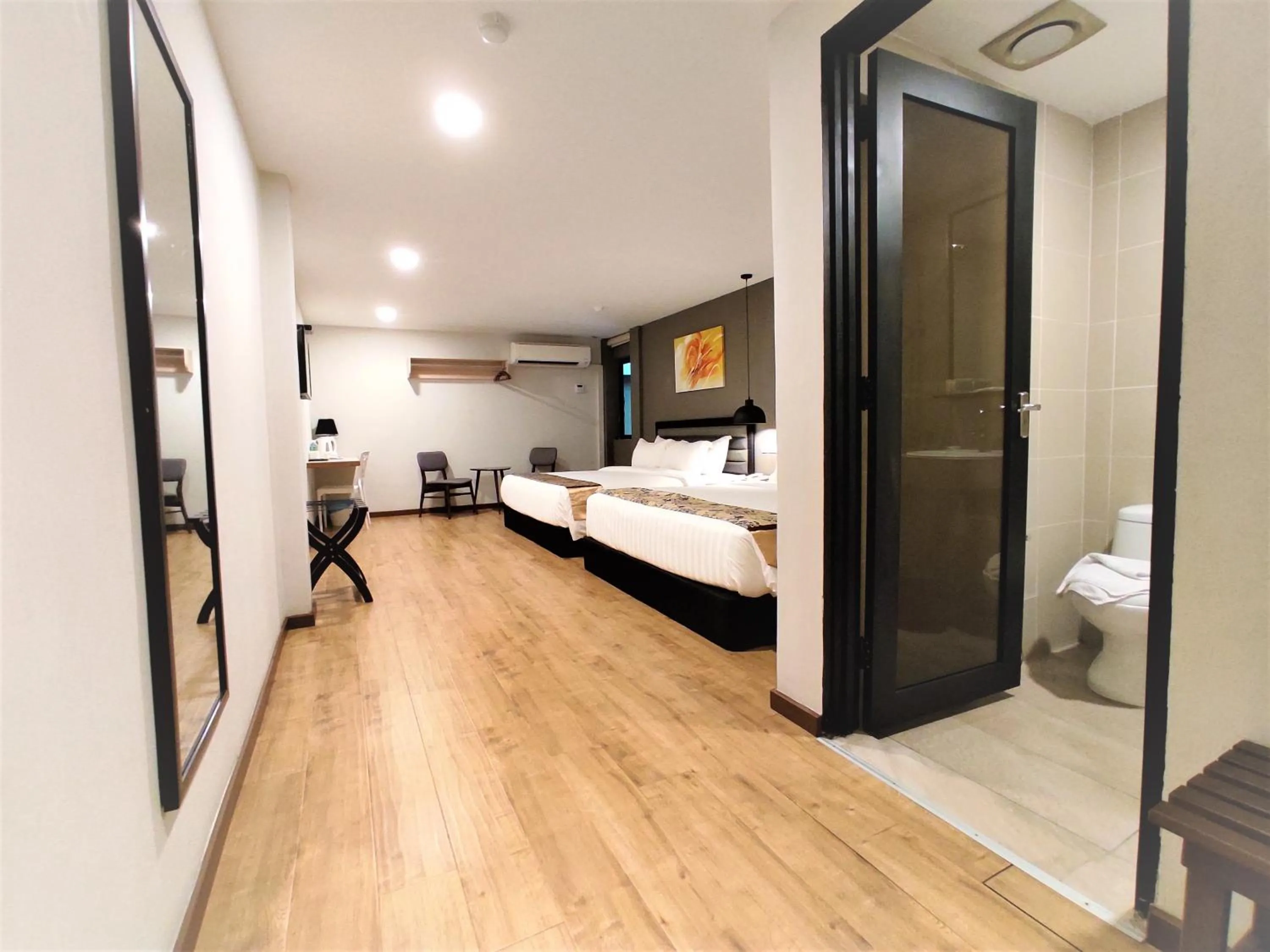 Photo of the whole room, Bed in Apple Suites Hotel