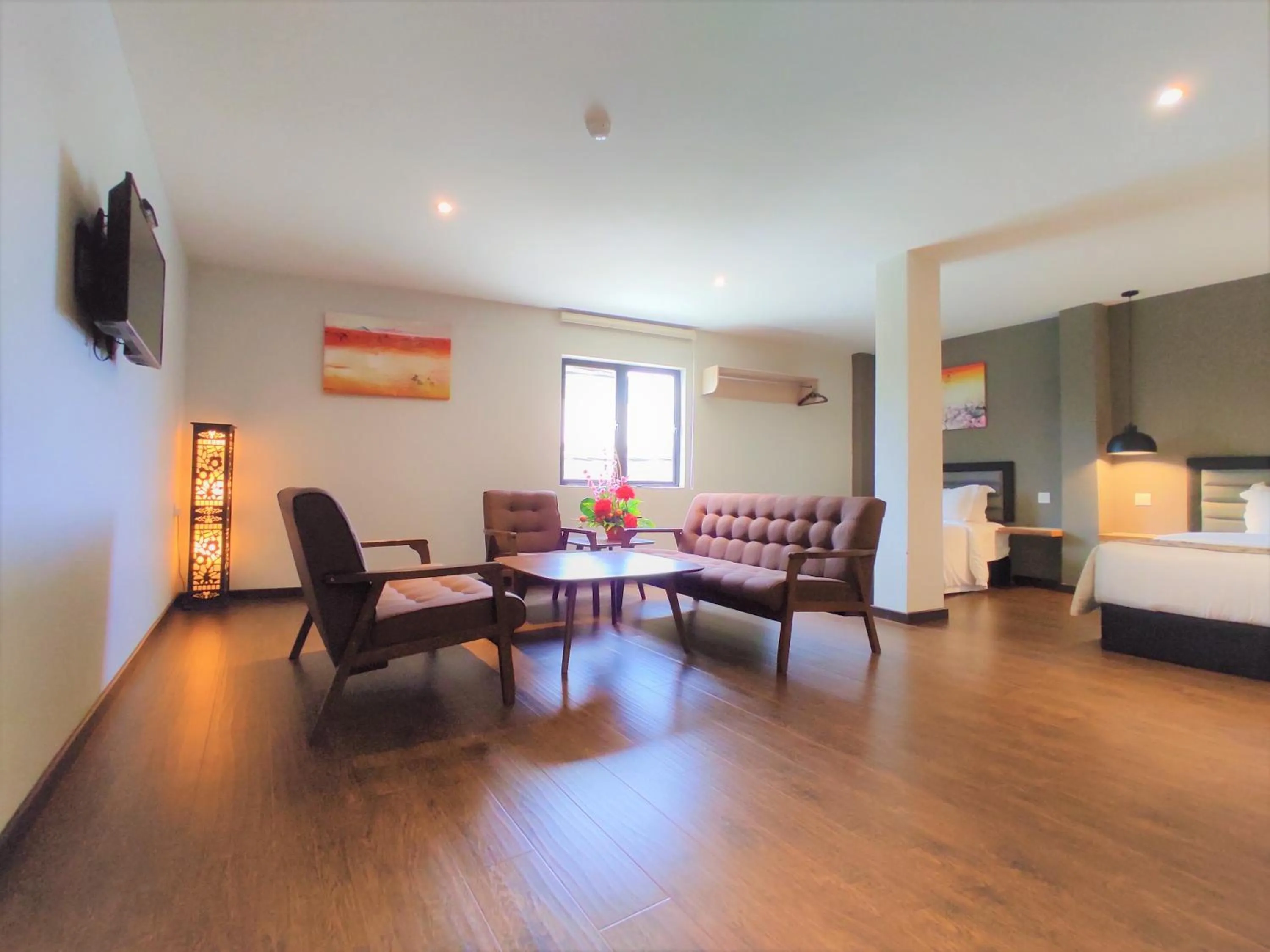 Photo of the whole room, Bed in Apple Suites Hotel