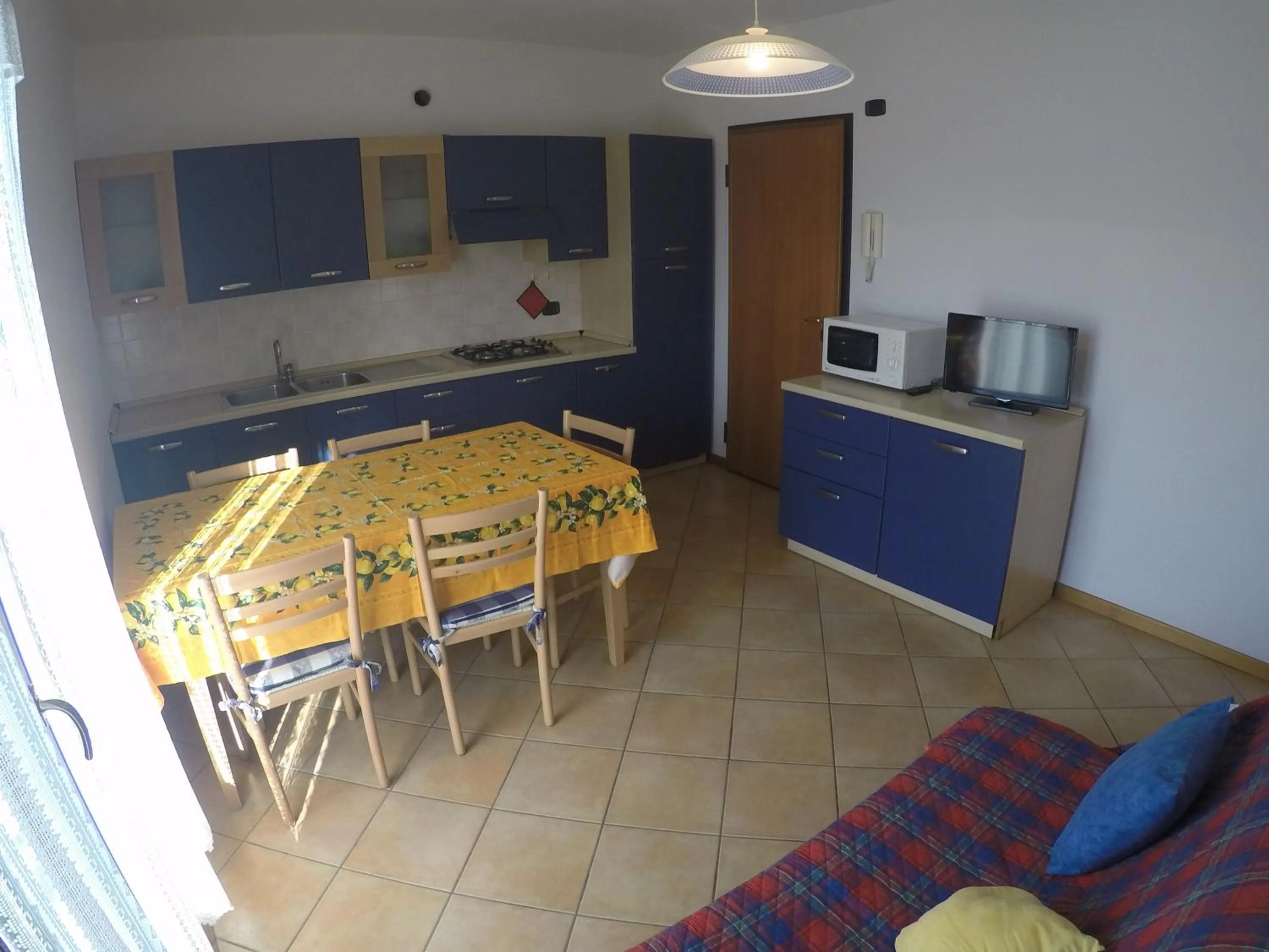 Kitchen or kitchenette in Residence Marina Blu - Agenzia Cocal