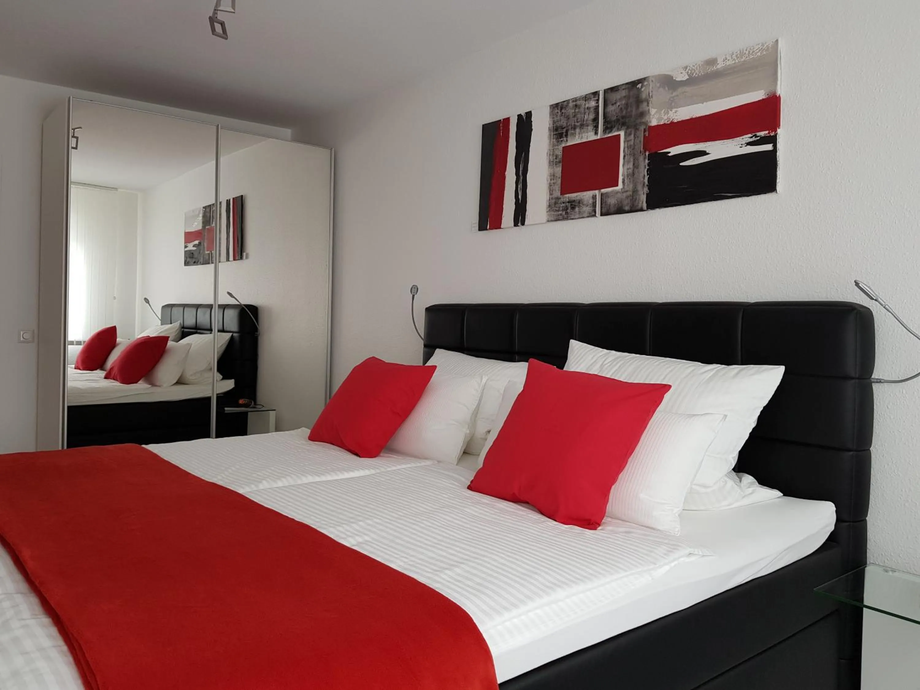 Bed in Innovative 2-Zimmer-Ferienwohnung am Kurpark 206