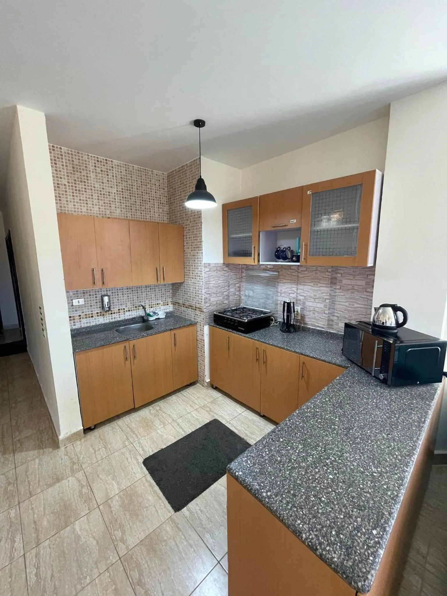 Kitchen or kitchenette in Yahia Blumar North Coast
