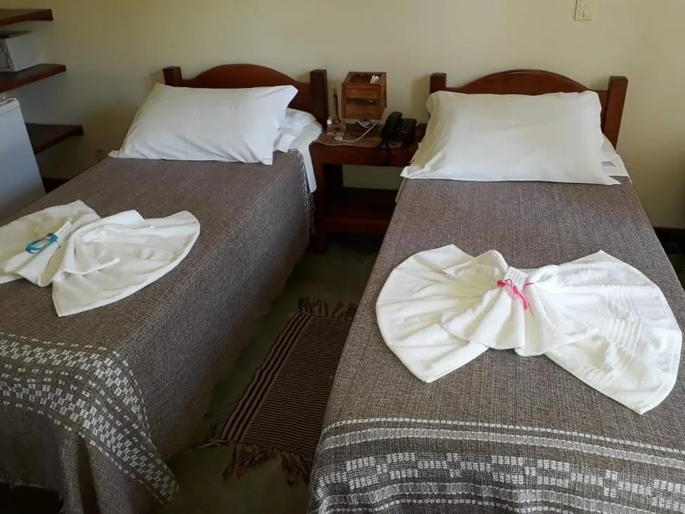 Bed in Pousada Ponta do Muta