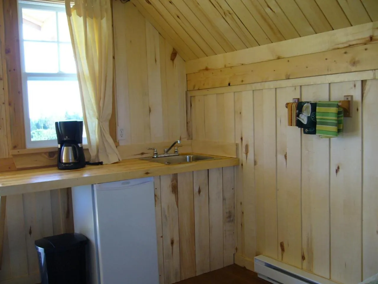 Kitchen or kitchenette in Chalets Nature Océan