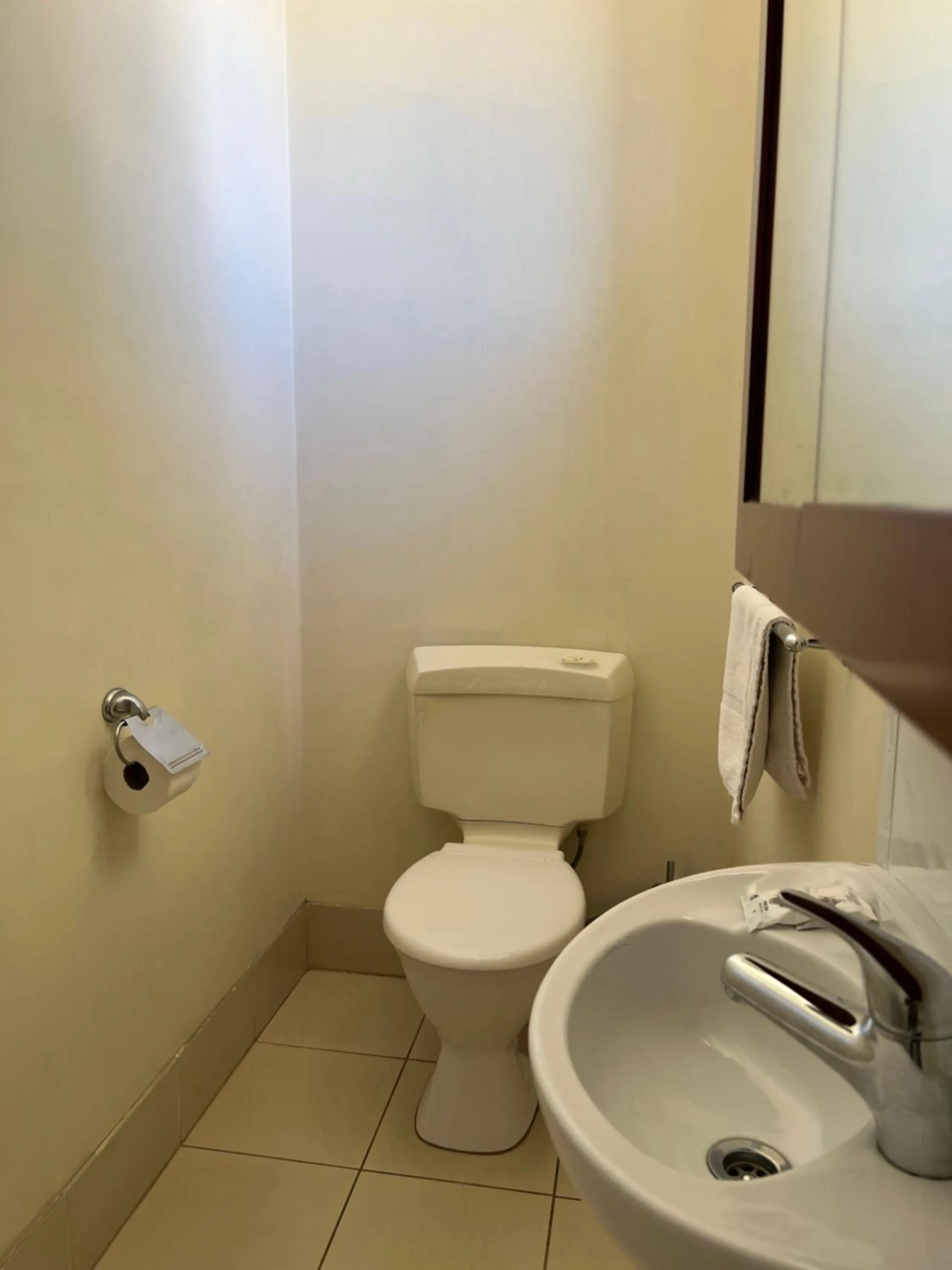 Toilet in Restawile Motel