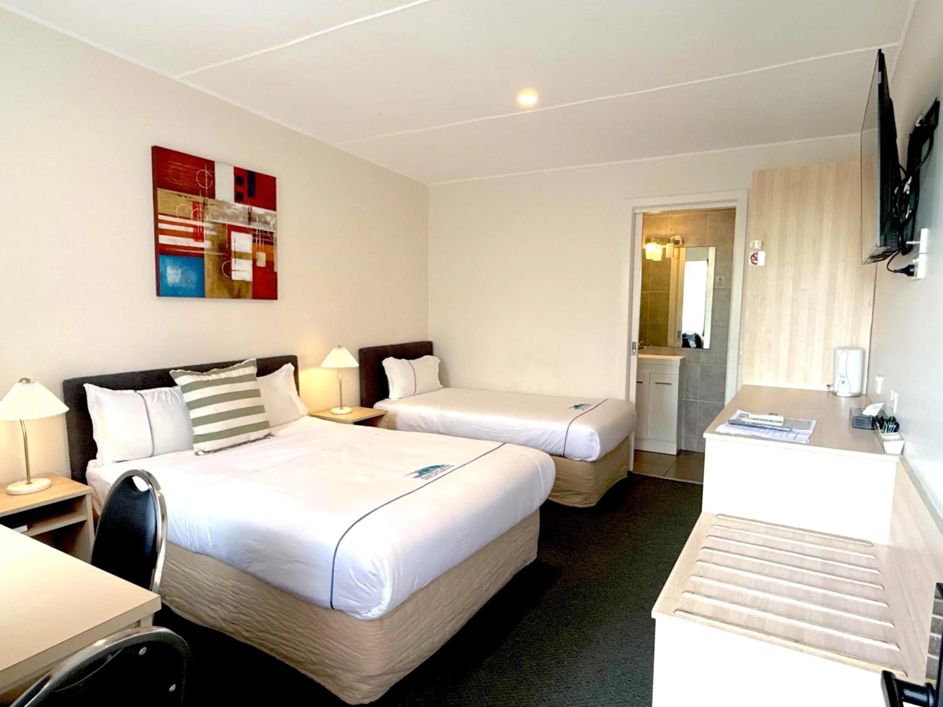 Area and facilities, Bed in Beachcomber Motel & Apartments