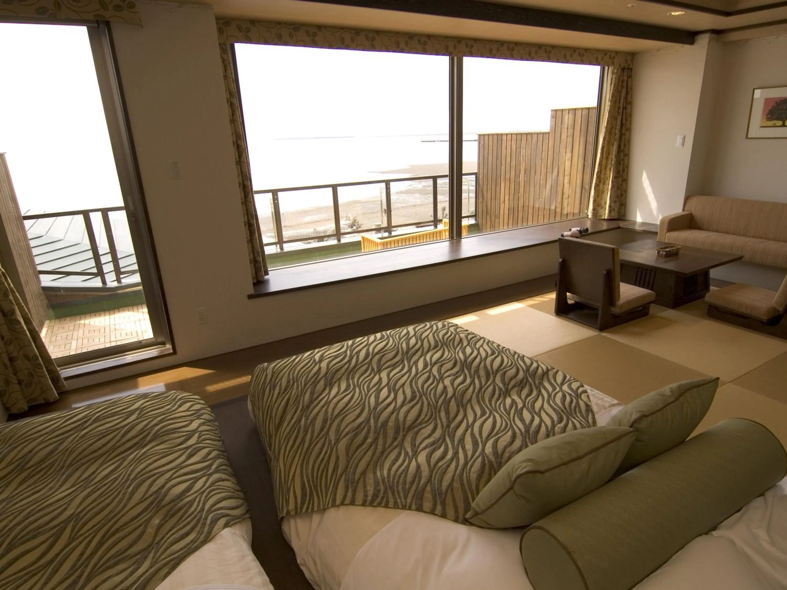 Photo of the whole room, Bed in Lake Saroma Tsuruga Resort