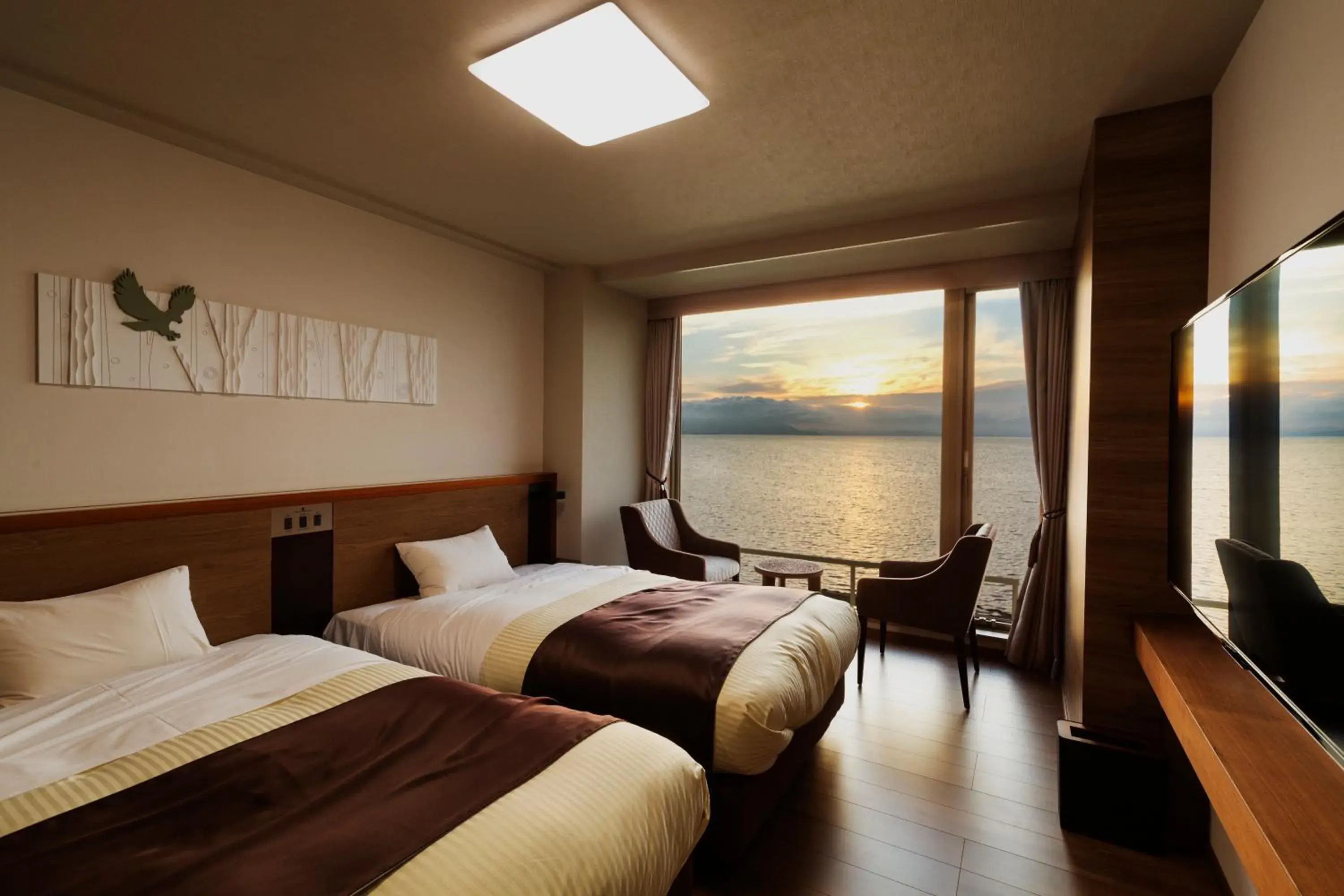 Photo of the whole room, Bed in Lake Saroma Tsuruga Resort Photo of the whole room, Bed in Lake Saroma Tsuruga Resort