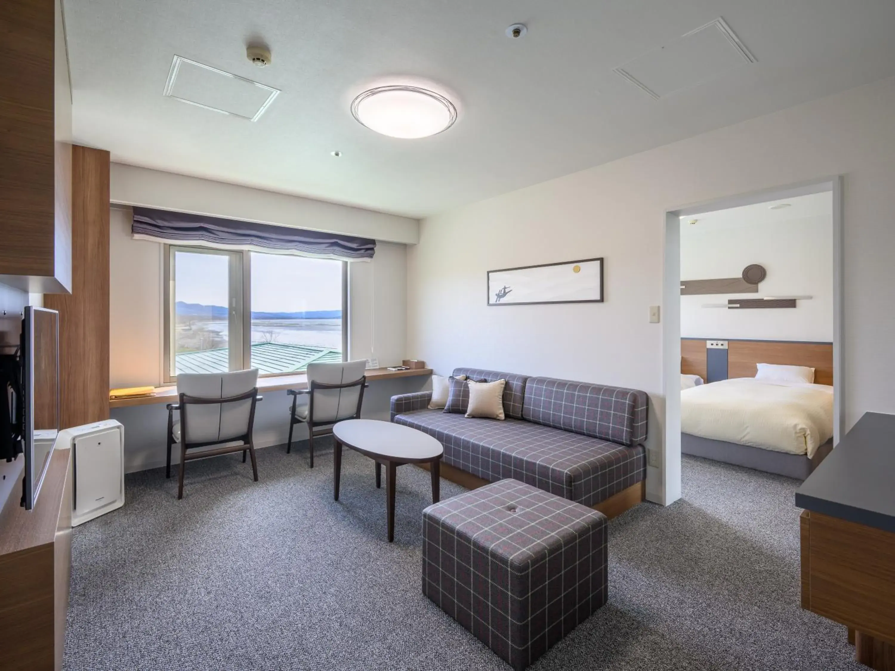 Photo of the whole room, Bed in Lake Saroma Tsuruga Resort Photo of the whole room, Bed in Lake Saroma Tsuruga Resort