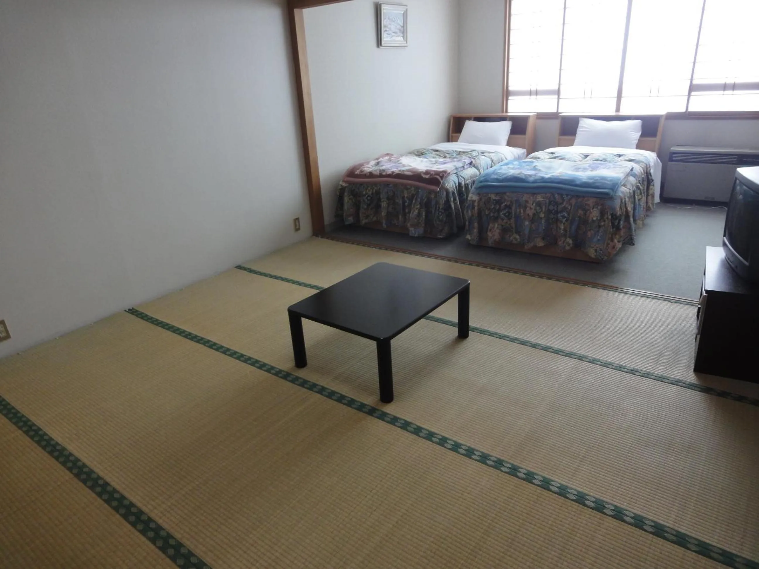Photo of the whole room, Bed in Star Hotel Akakura