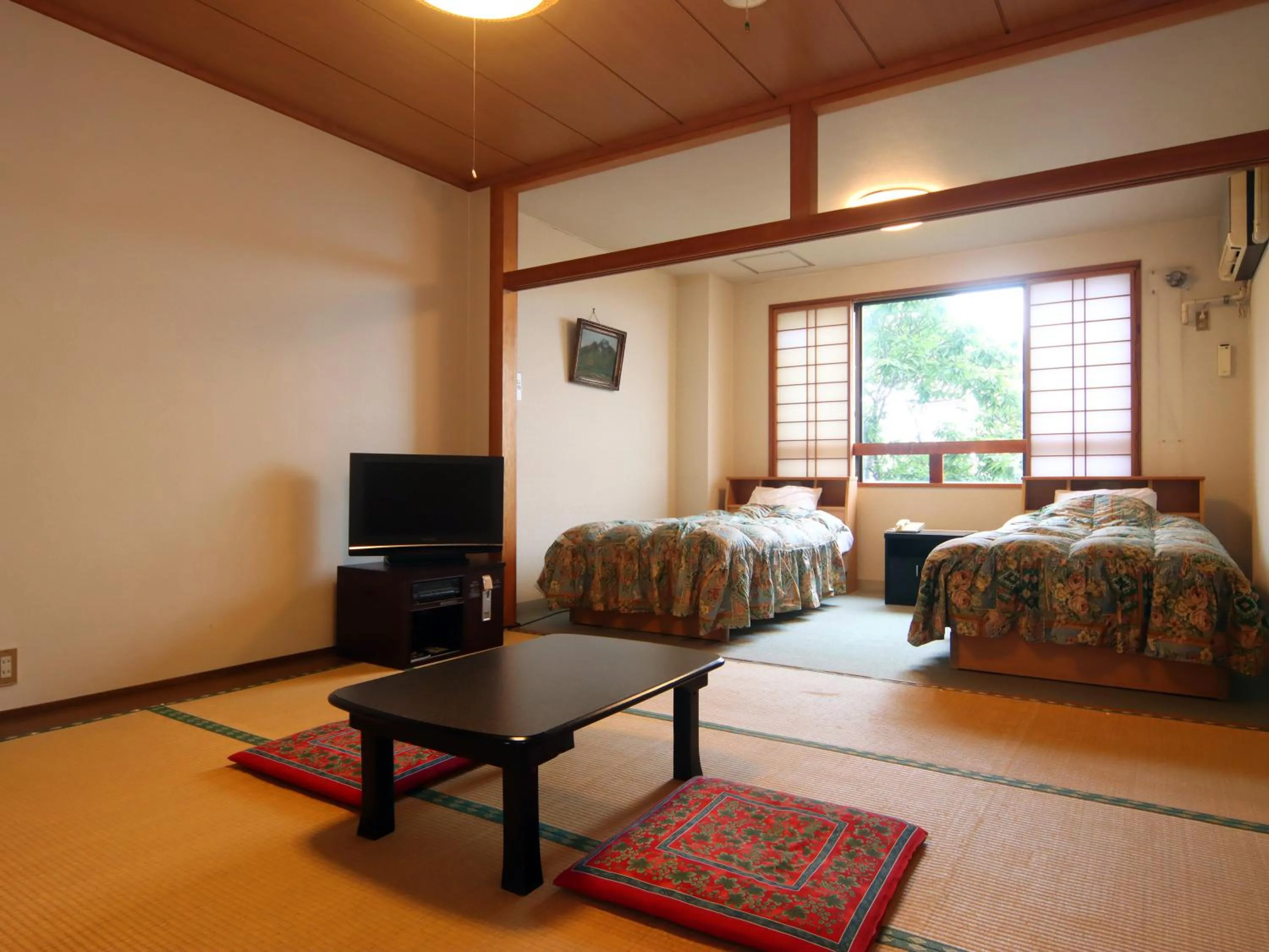 Photo of the whole room, Bed in Star Hotel Akakura