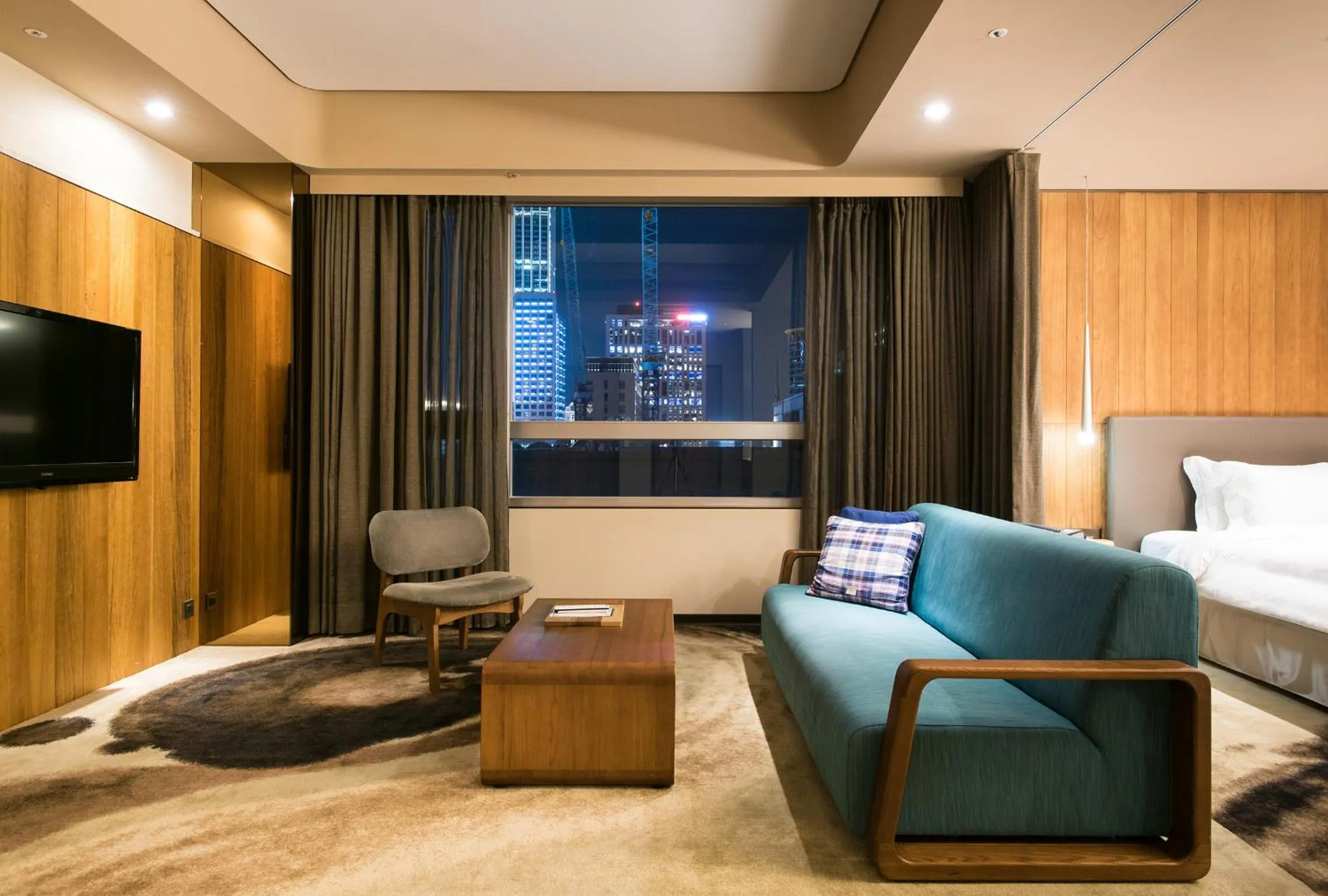 Living room, Bed in Home Hotel