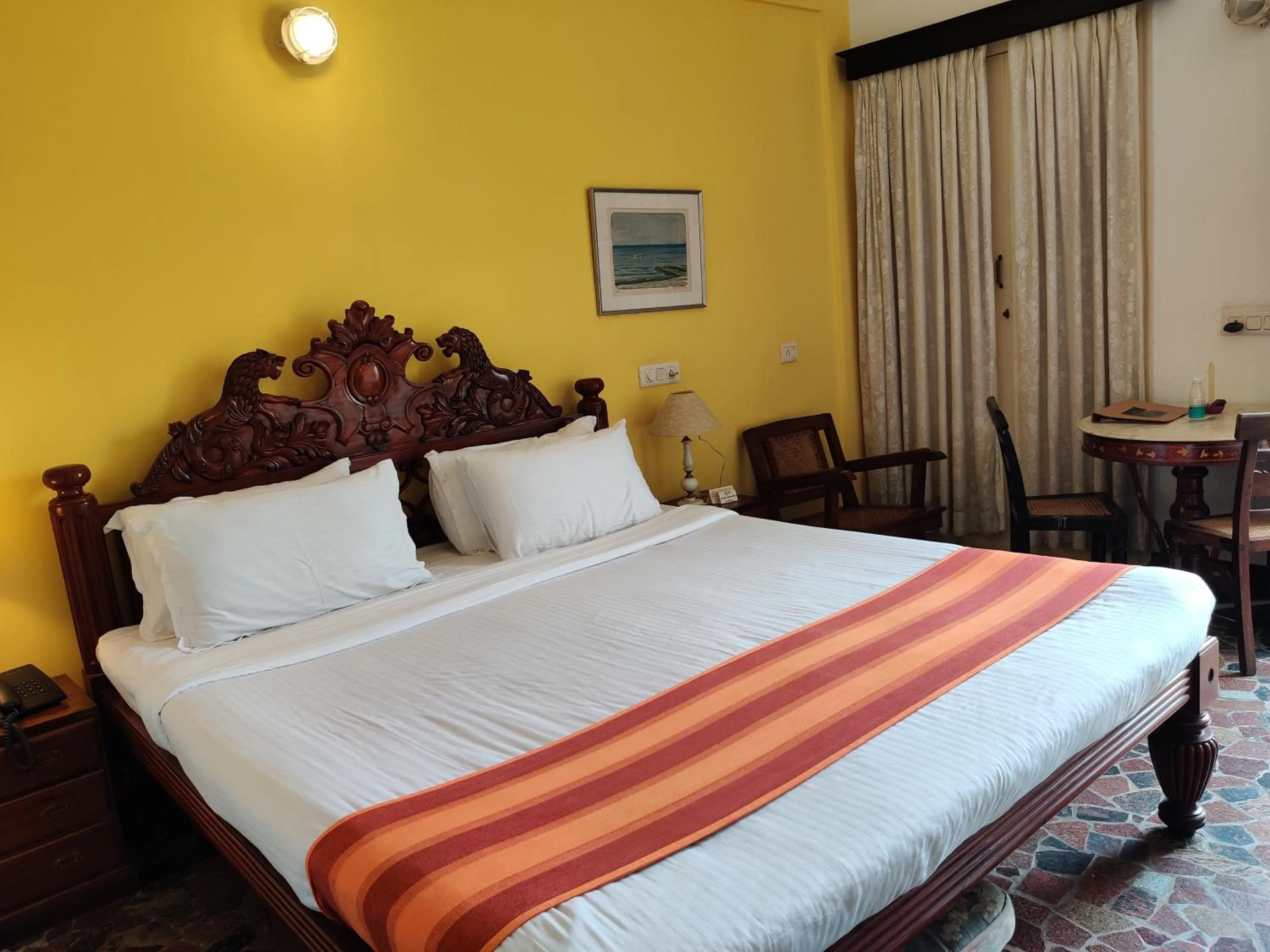 Bed in WelcomHeritage Panjim Inn