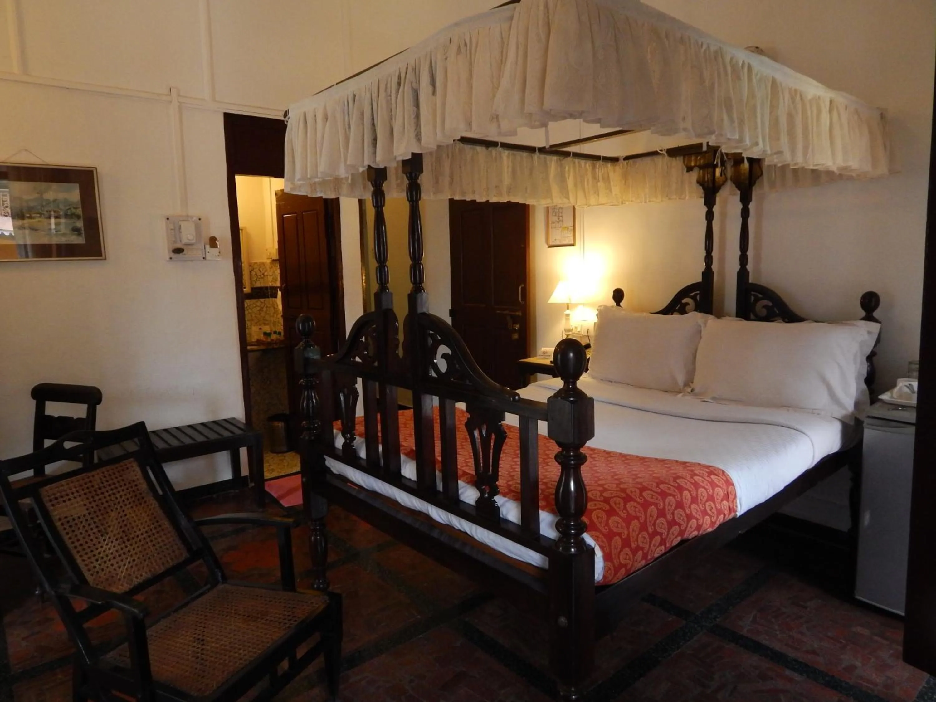 Photo of the whole room, Bed in WelcomHeritage Panjim Inn