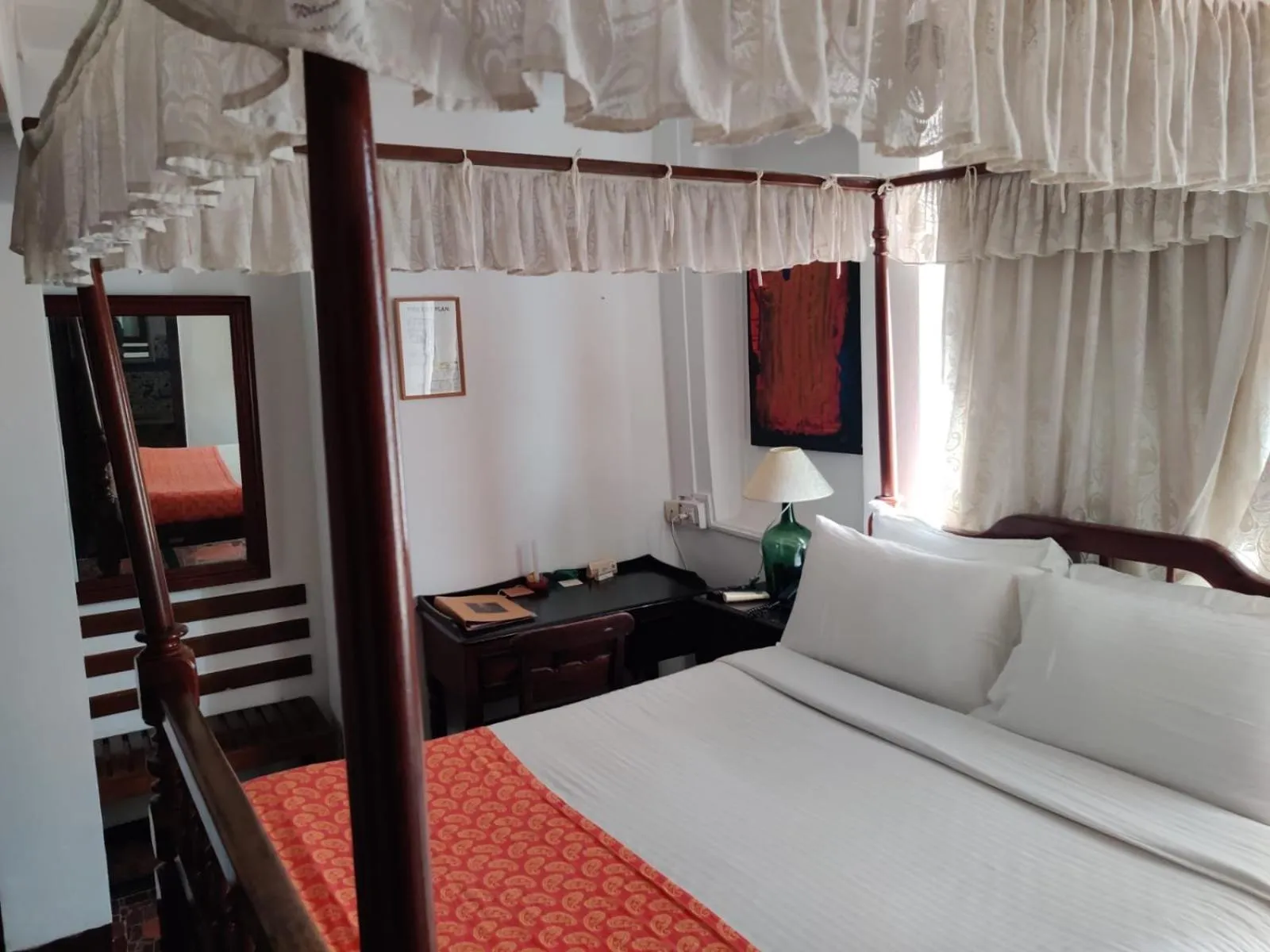 Bed in WelcomHeritage Panjim Inn