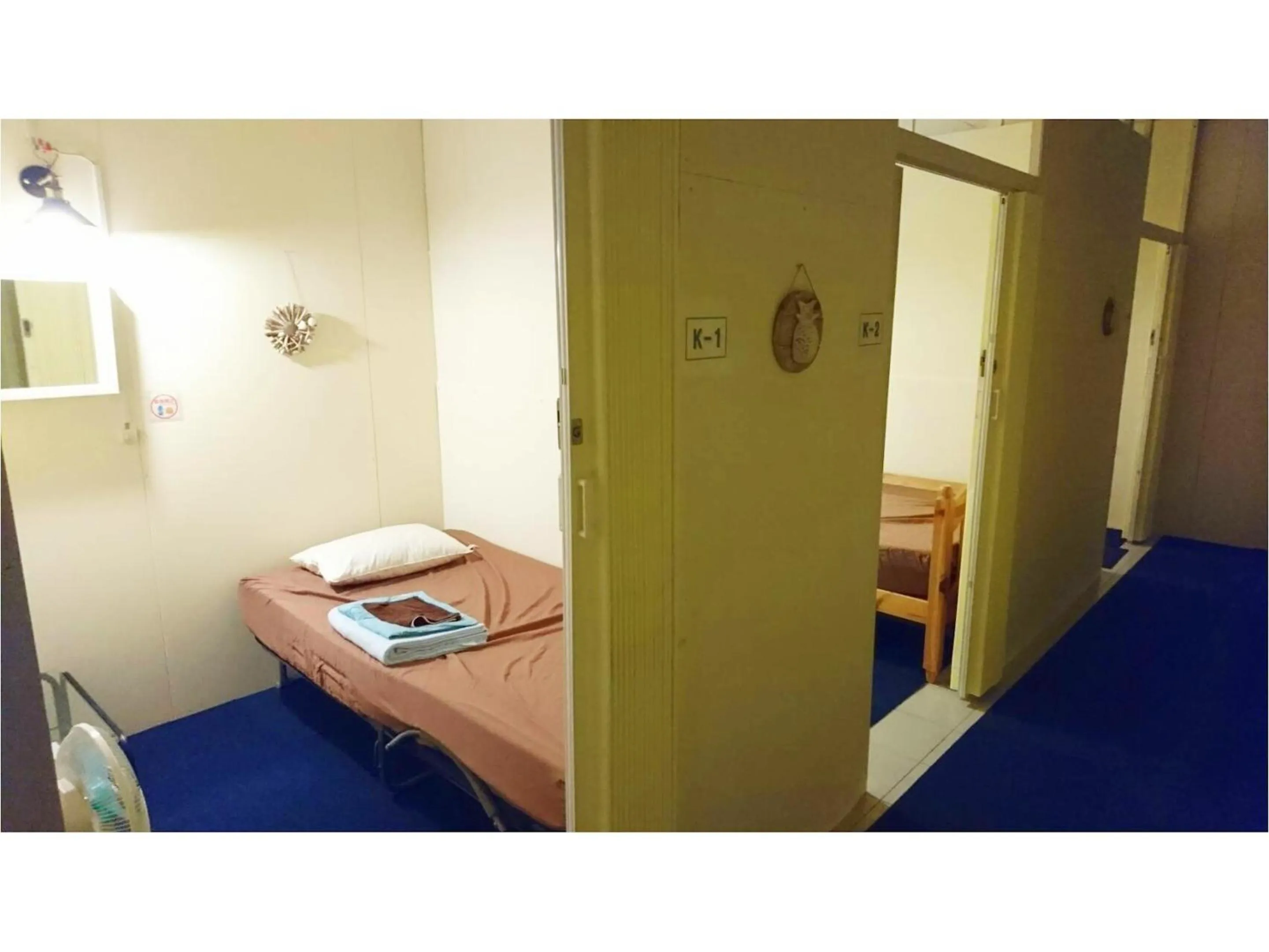 Bedroom, Bed in Guesthouse Churayado Ishigakijima