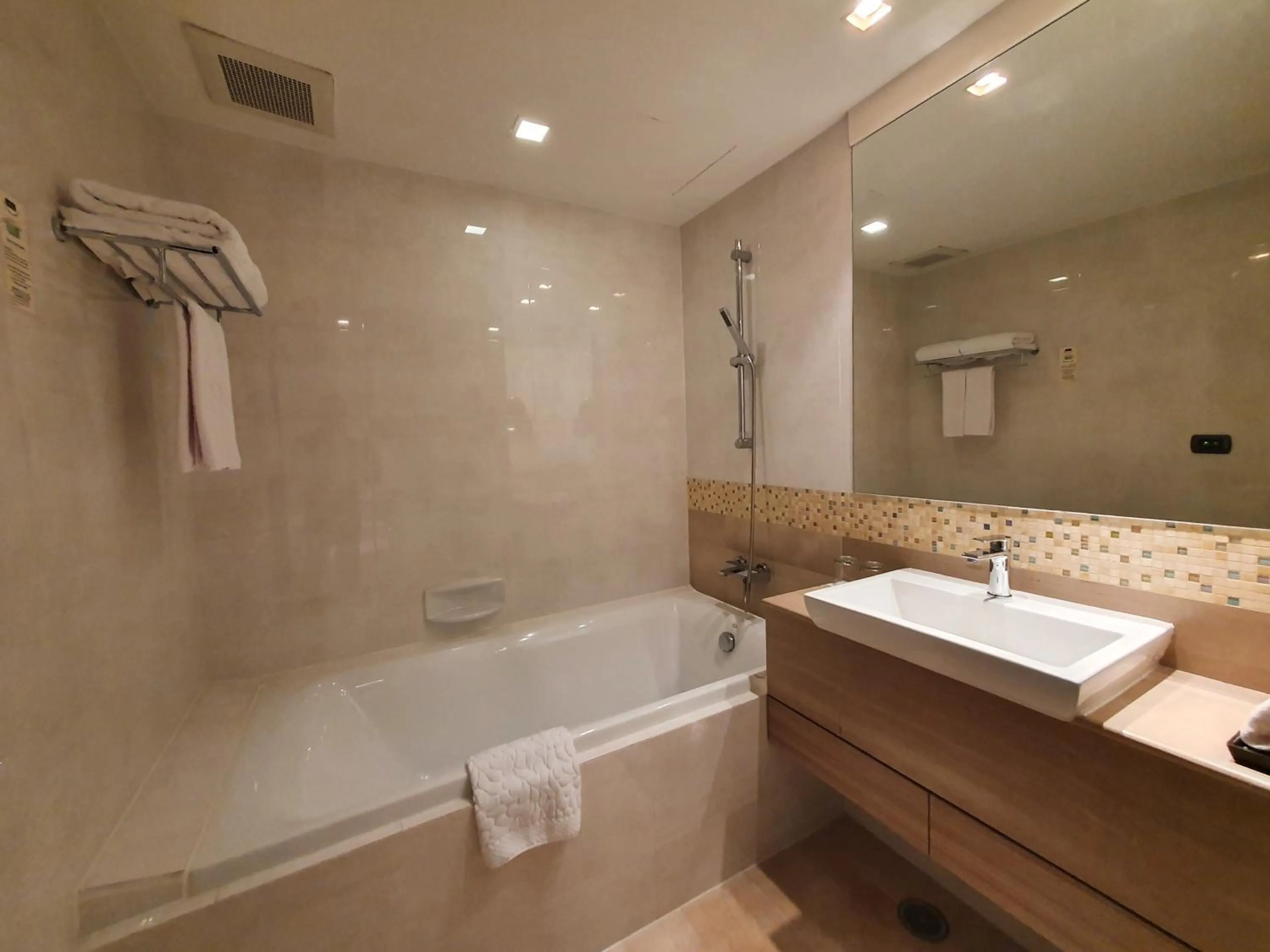 Shower in Amora NeoLuxe Suites Hotel