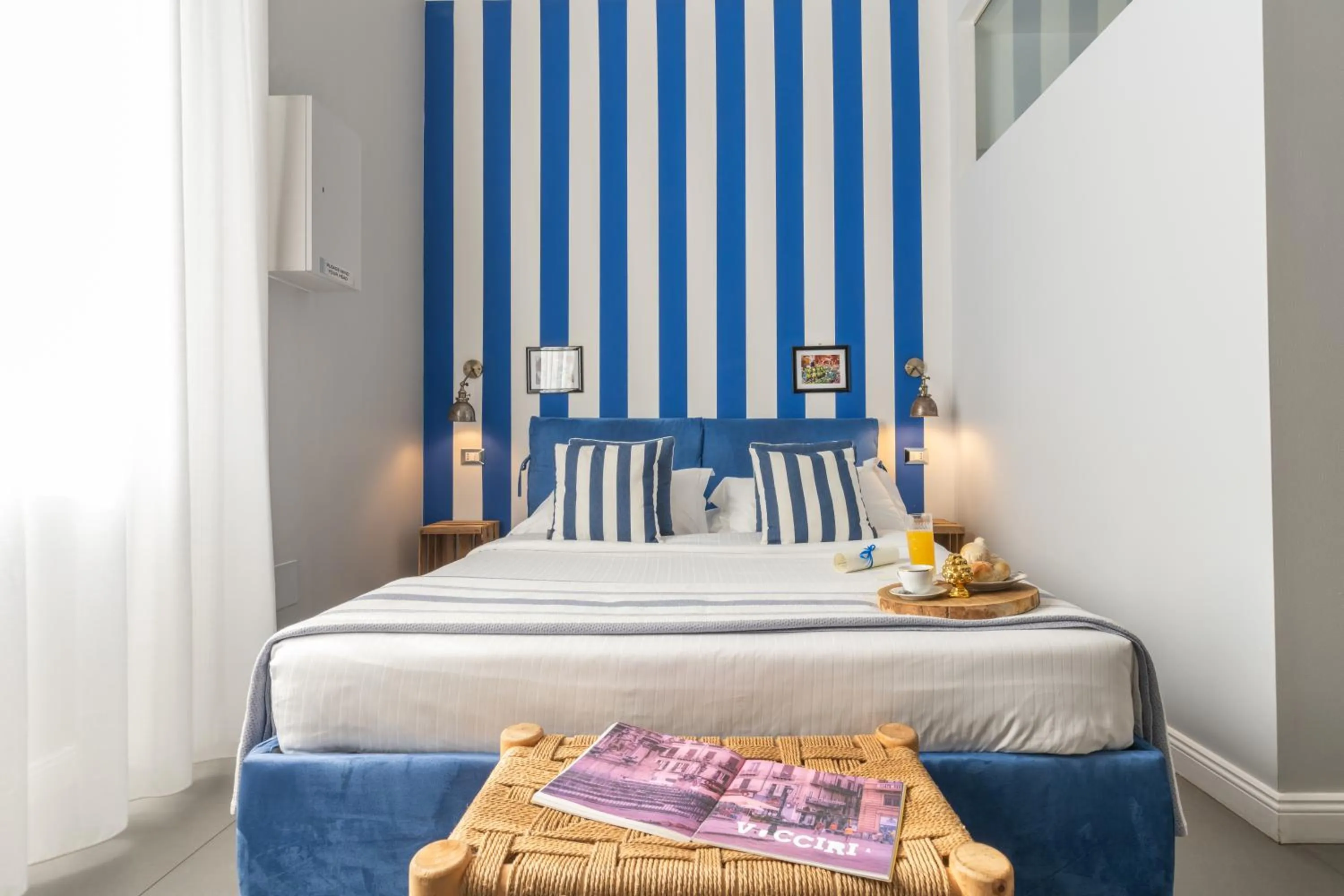 Bed in Family Affair Luxury Rooms&Suites