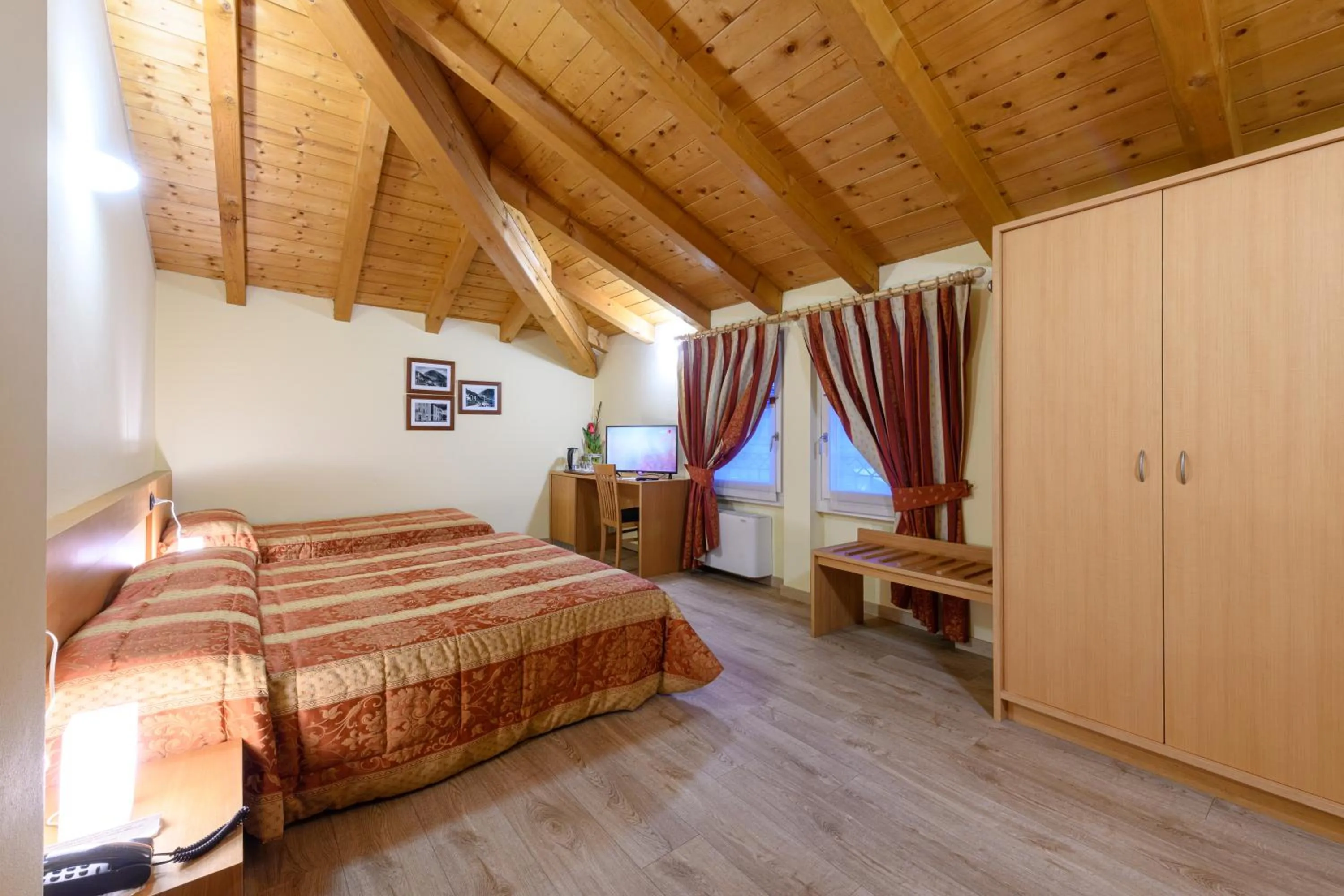 Photo of the whole room, Bed in Hotel Garni Le Corti