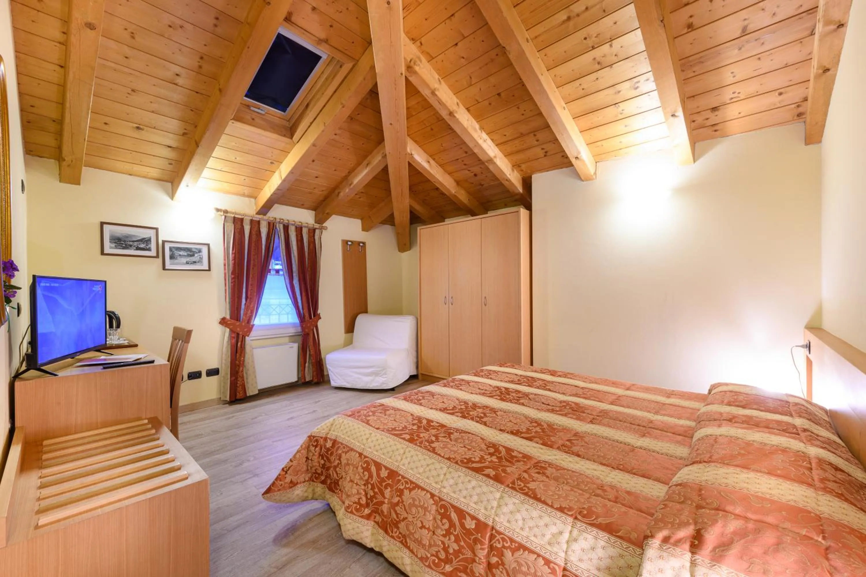 Photo of the whole room, Bed in Hotel Garni Le Corti