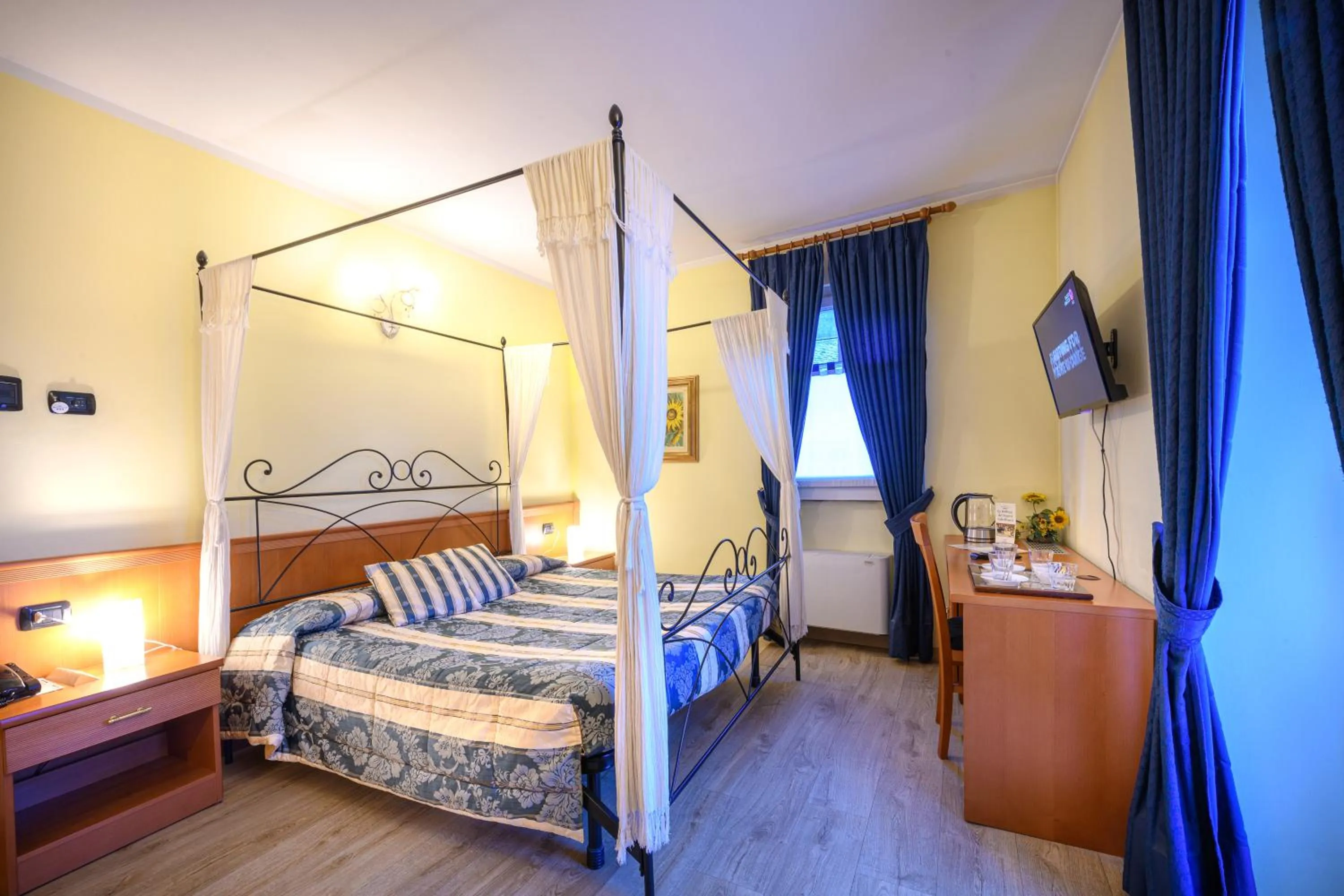 Bed in Hotel Garni Le Corti