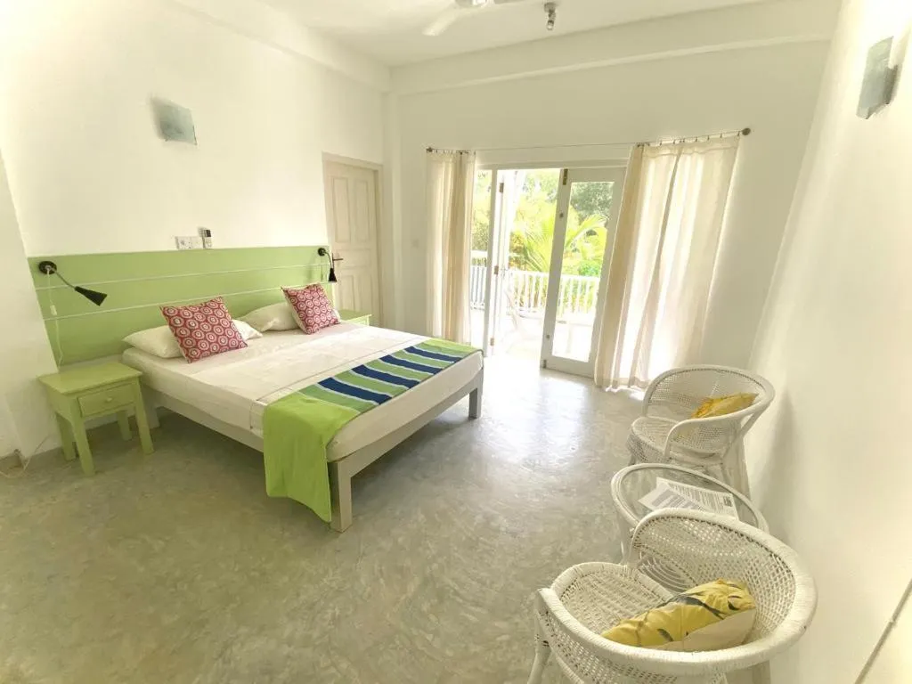 Photo of the whole room, Bed in Plantation House