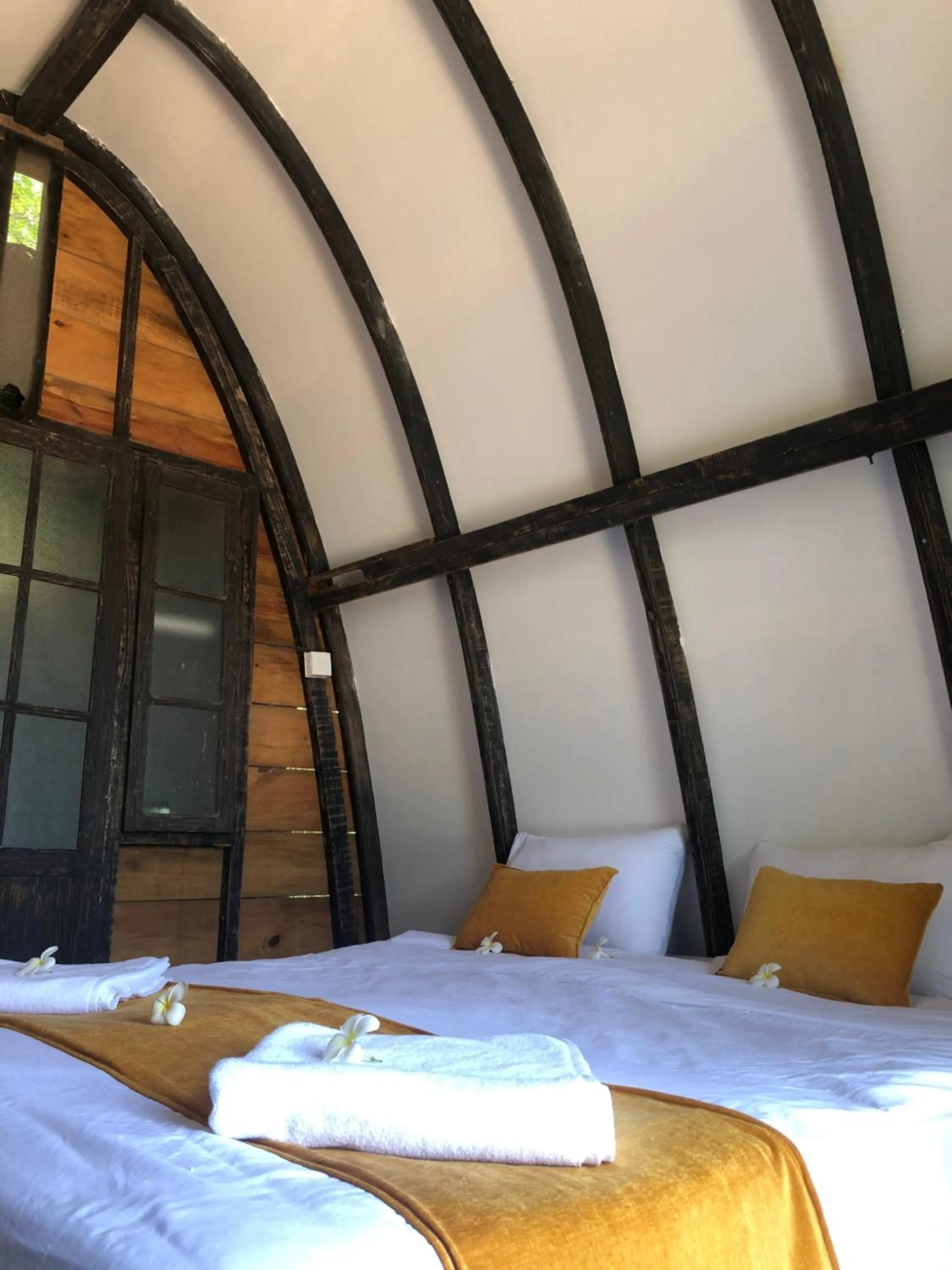 Bed in Moon Isle Beach Bungalow