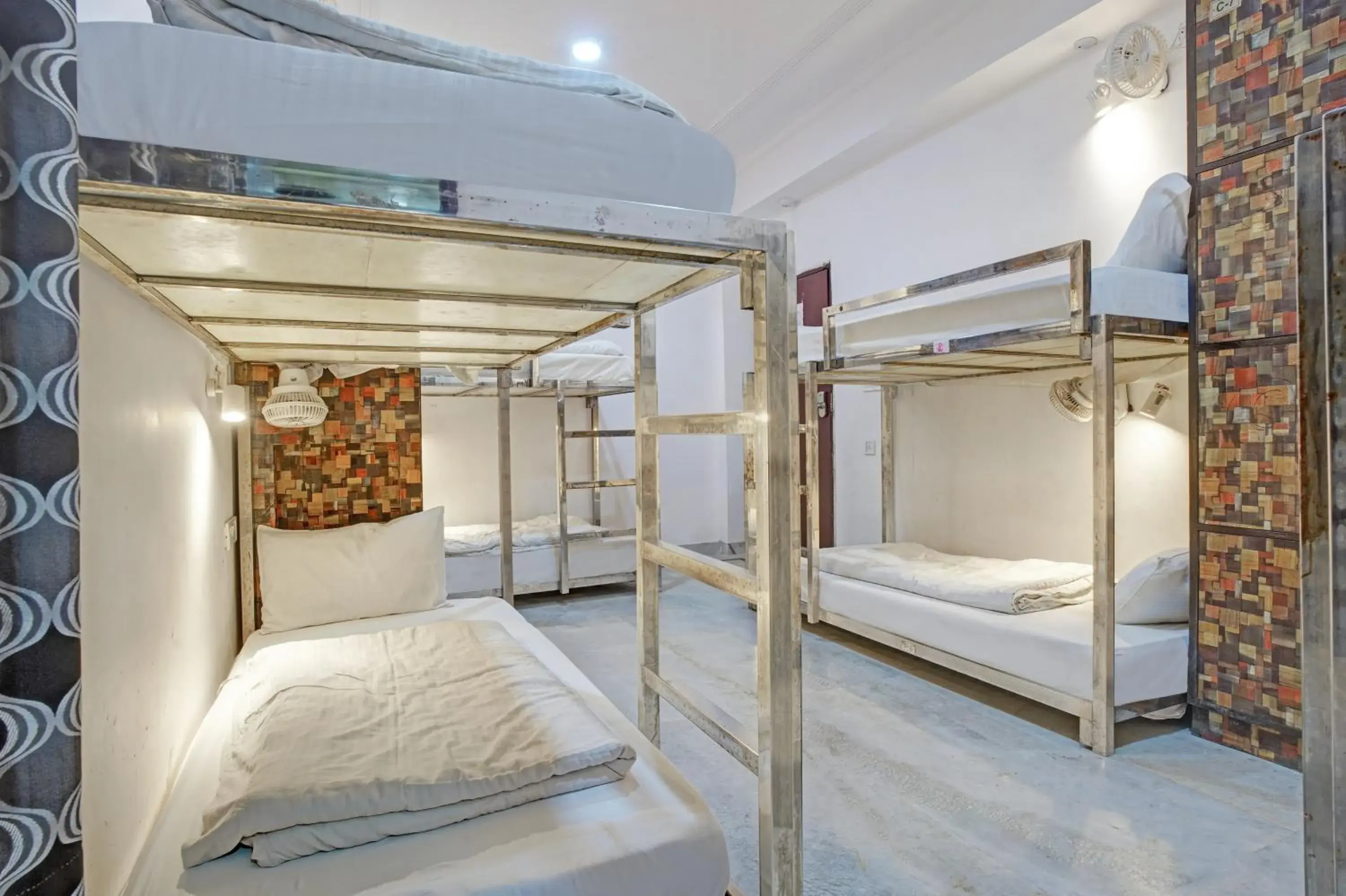 Bed in 8-Bed Mixed Dormitory Room in Hindustan By Backpackers Heaven - Traveller's Choice Award 2025 Best of Best Winning Hotel Bed in 8-Bed Mixed Dormitory Room in Hindustan By Backpackers Heaven - Traveller's Choice Award 2025 Best of Best Winning Hotel