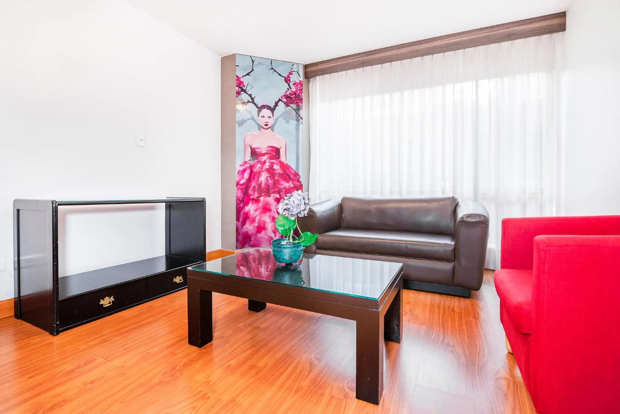 Living room in Lloyds Apartasuites Parque 93