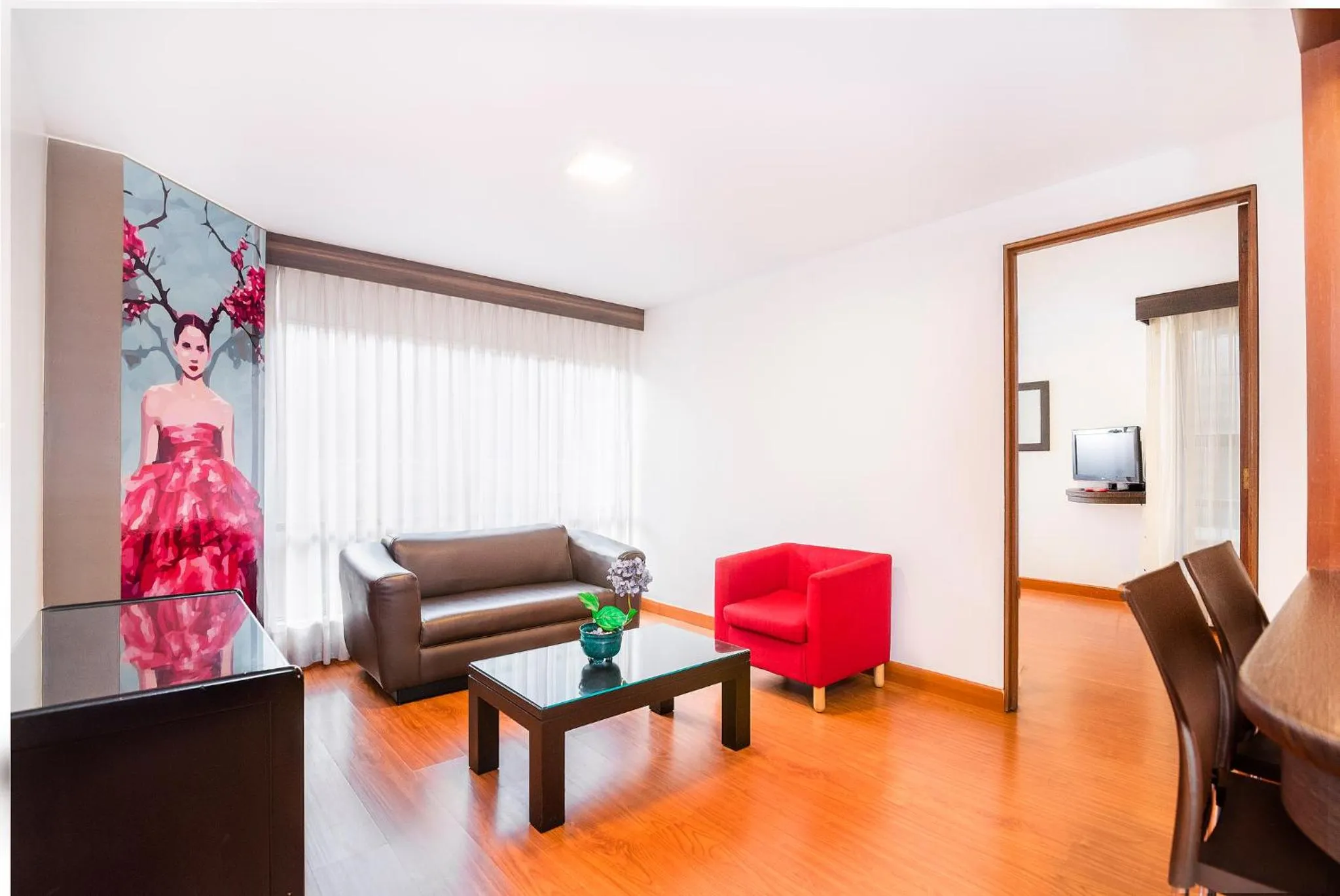 Living room in Lloyds Apartasuites Parque 93