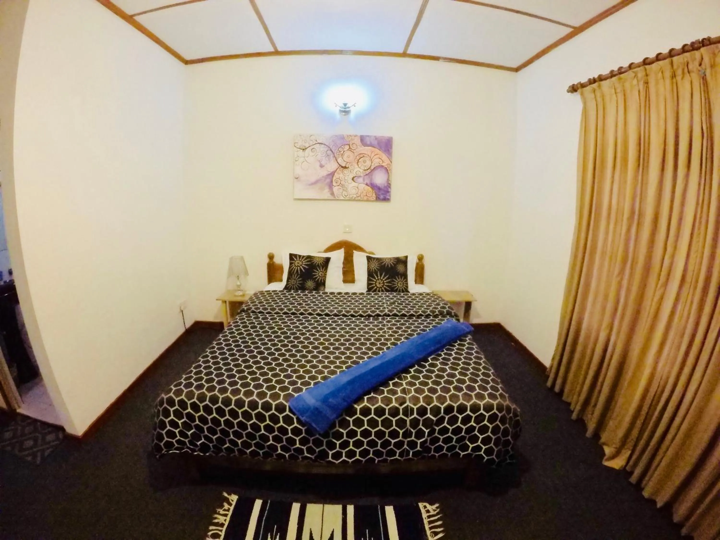 Bed in New Royal Mount Hotel