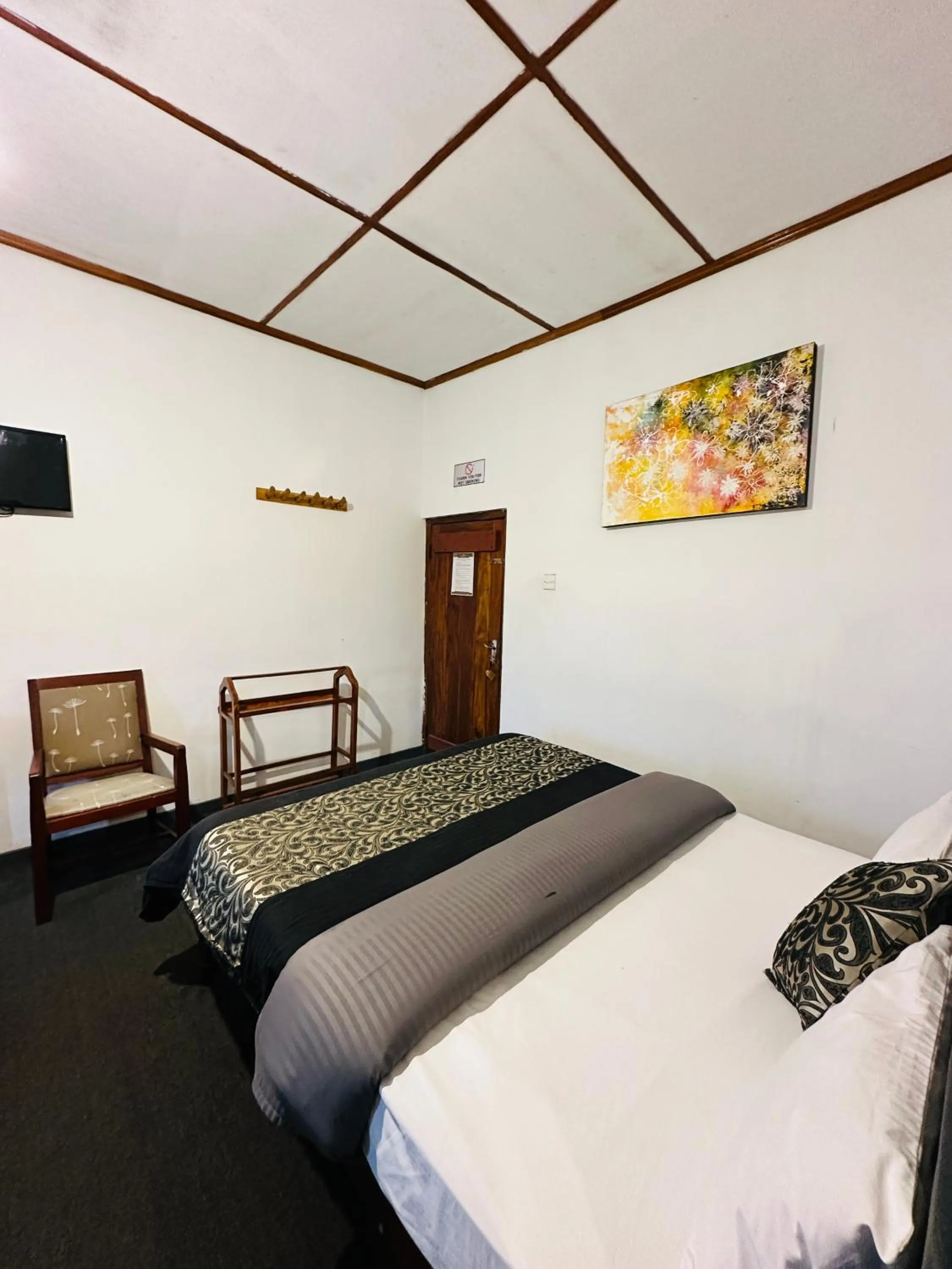 Bed in New Royal Mount Hotel