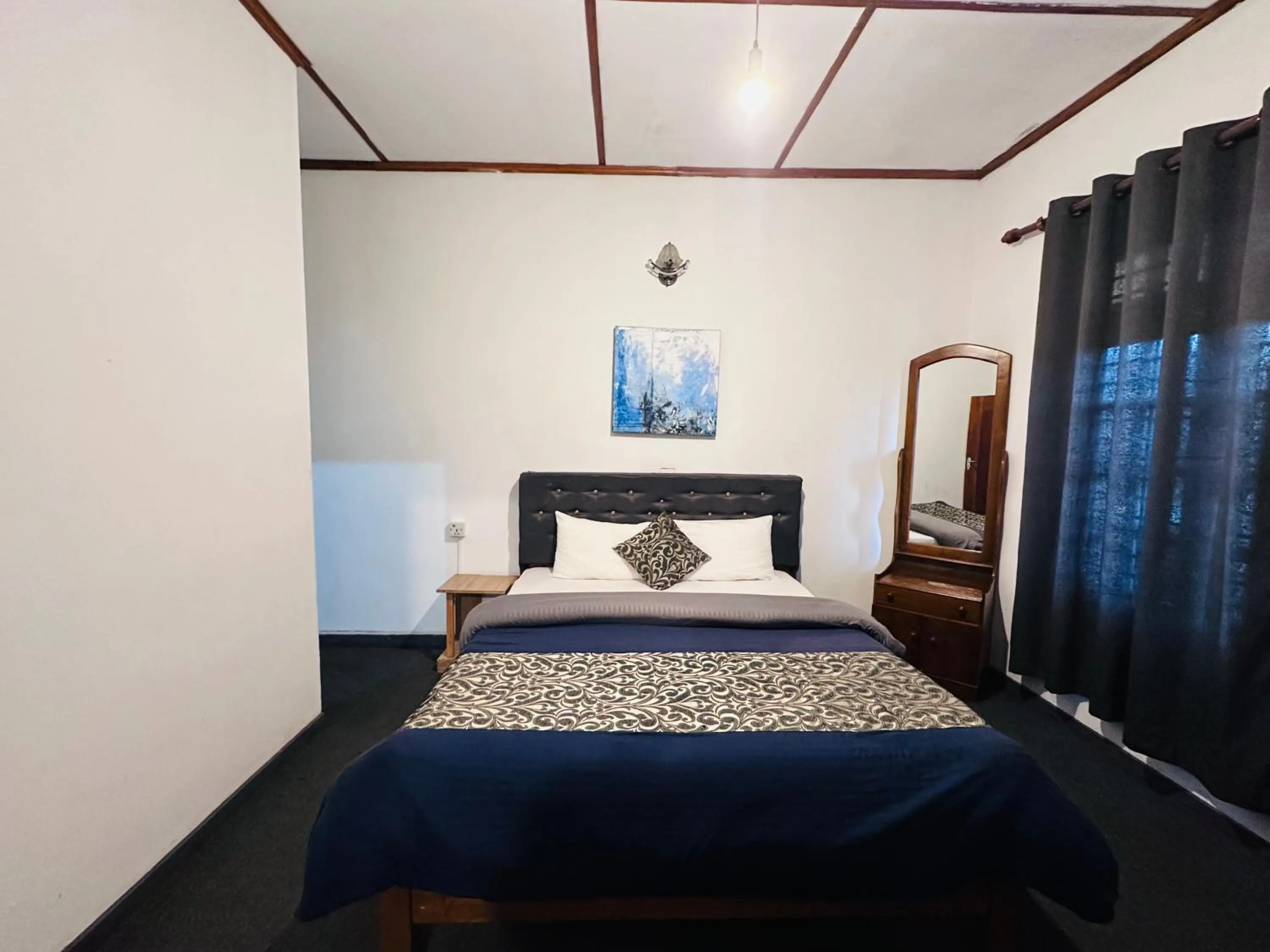 Bed in New Royal Mount Hotel