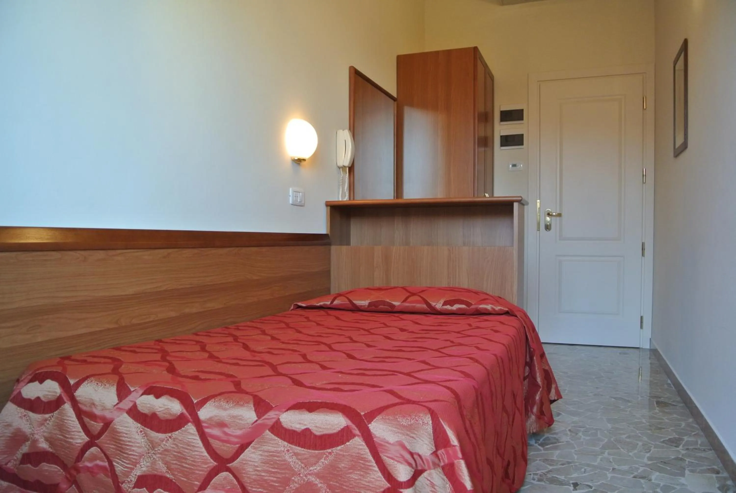 Bed in Hotel Tiffany