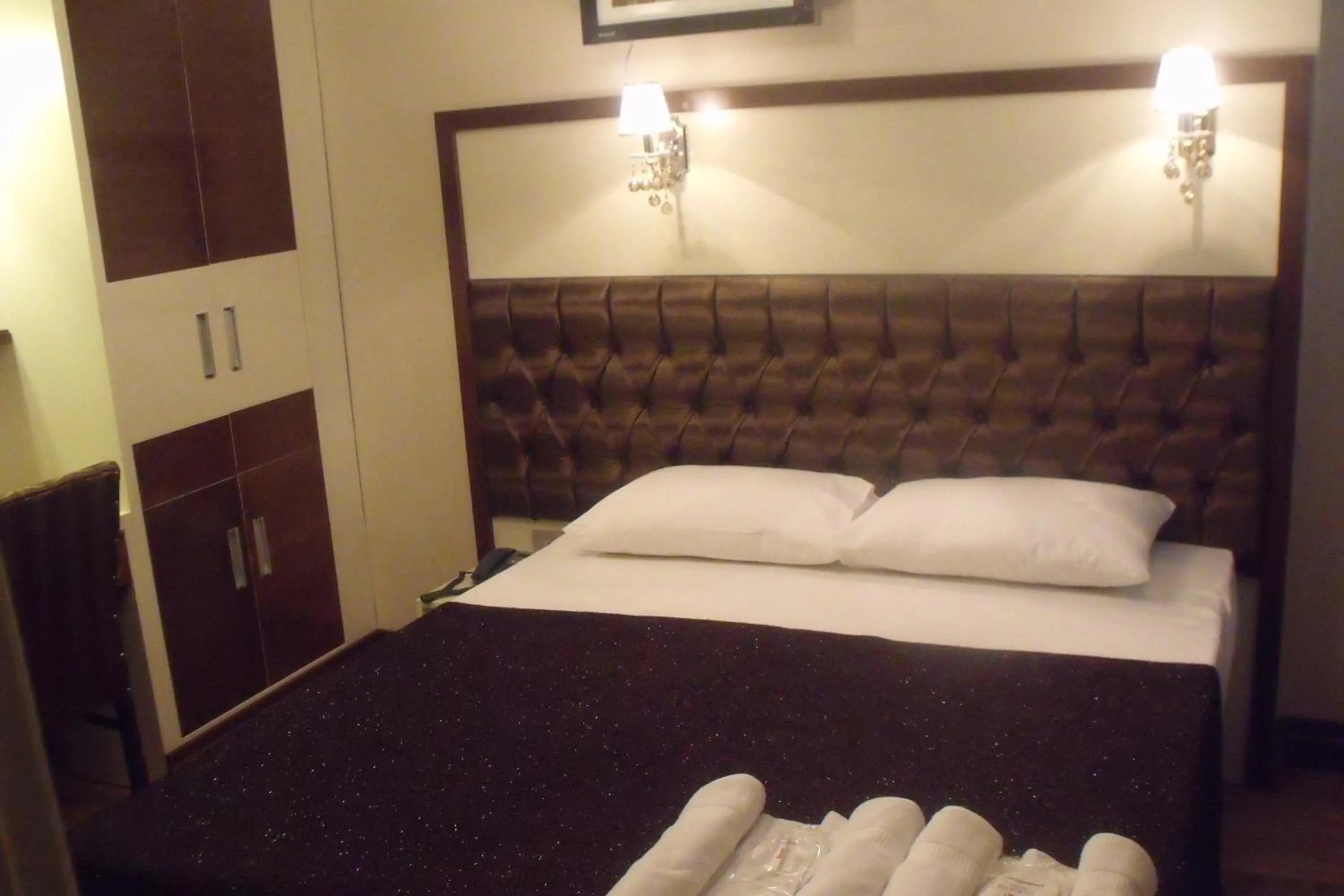 Bed in Gloria Tibi Hotel