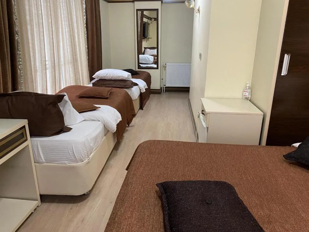 Bed in Gloria Tibi Hotel