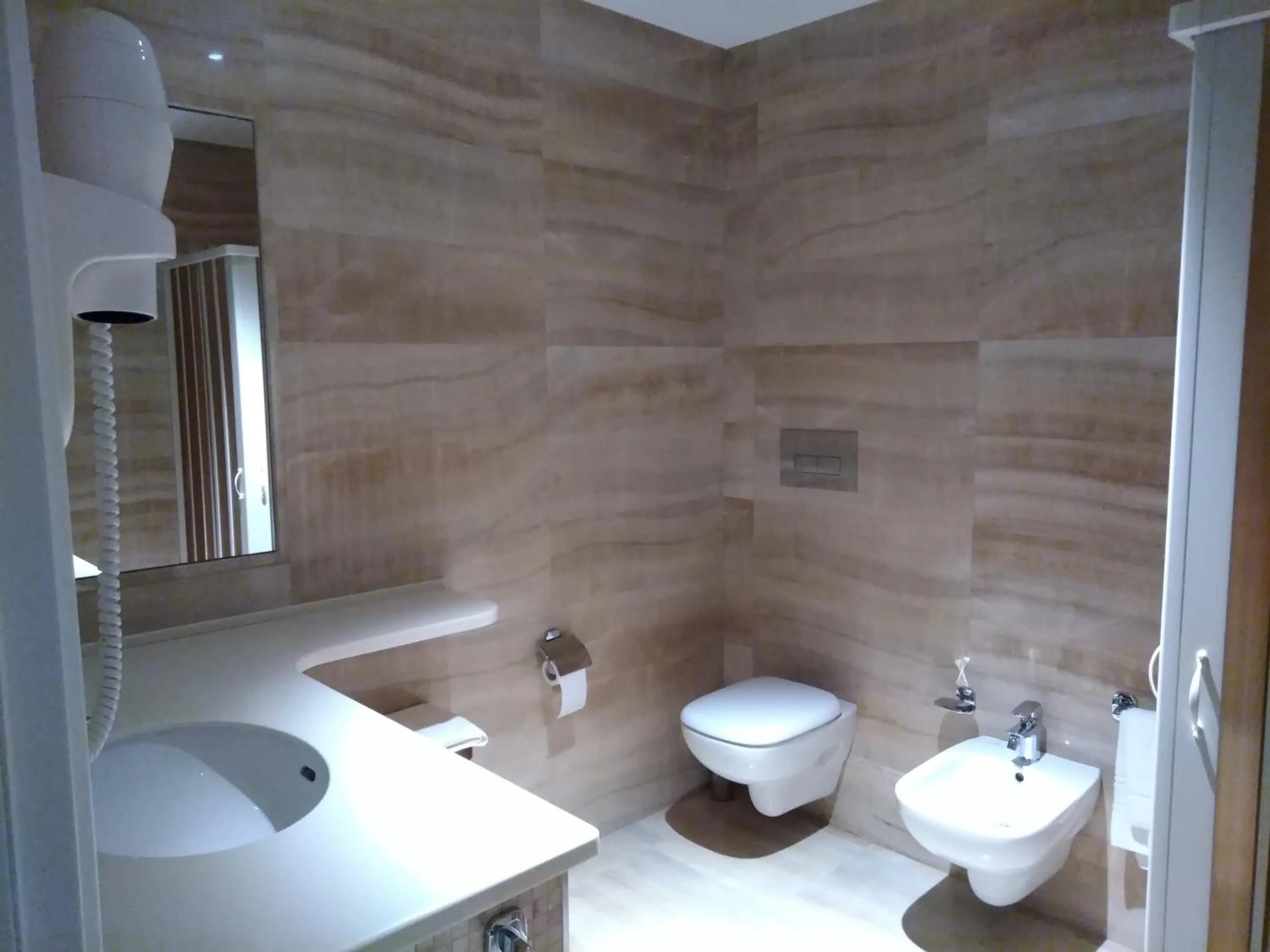 Bathroom in Family Center Hotel